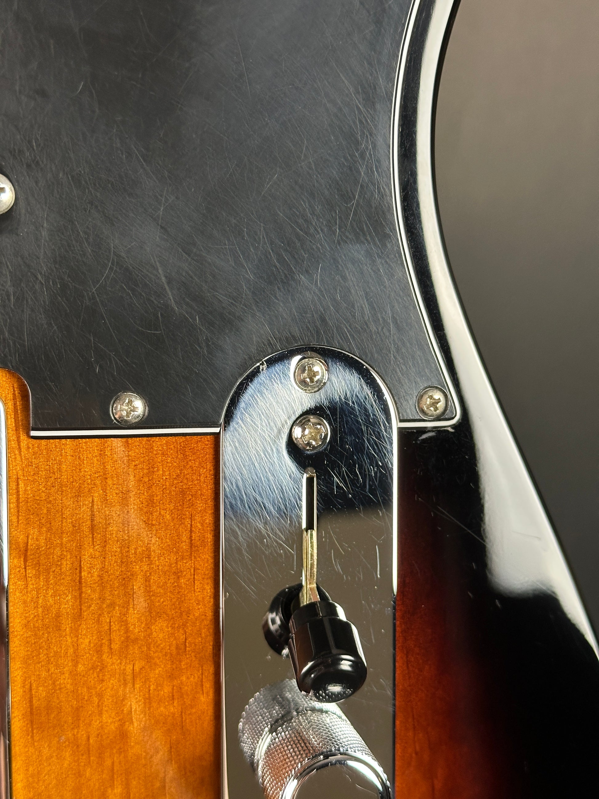 Scratches on control plate of Used 2021 Fender Deluxe Nashville Telecaster Sunburst.