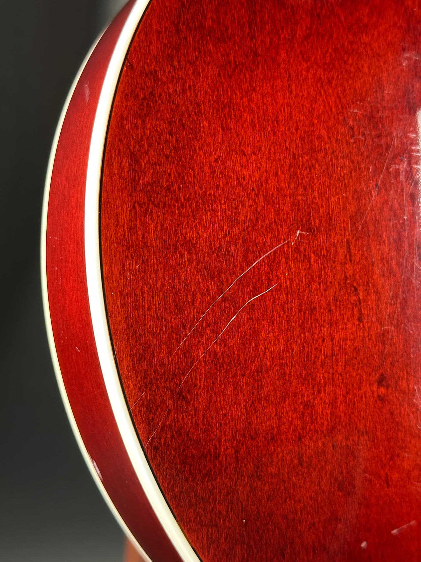 Scratches on back of Used Gretsch G2655T Cherry.