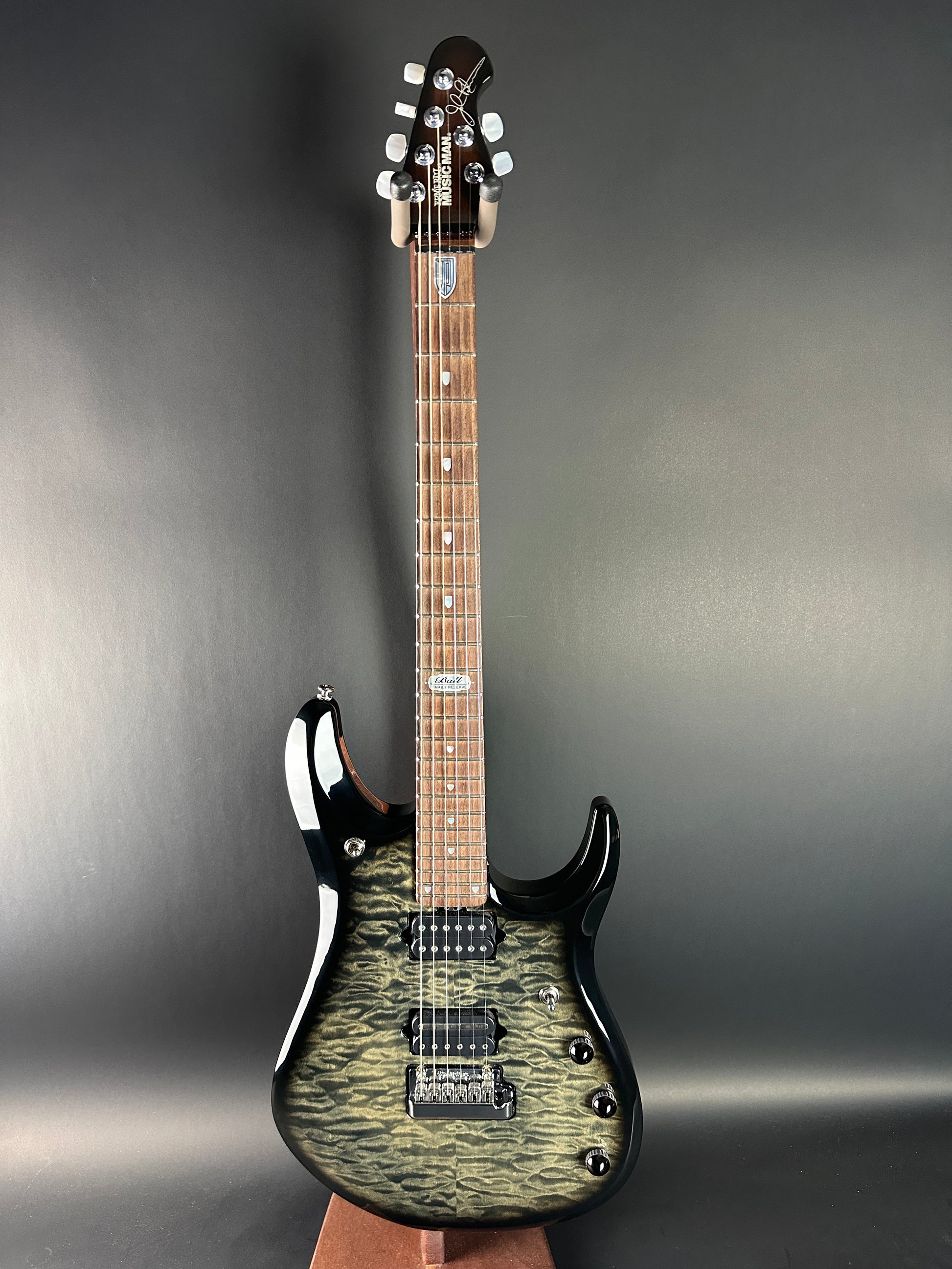 Full front of Used 2007 Ernie Ball Family Reserve Petrucci Black Sunburst.