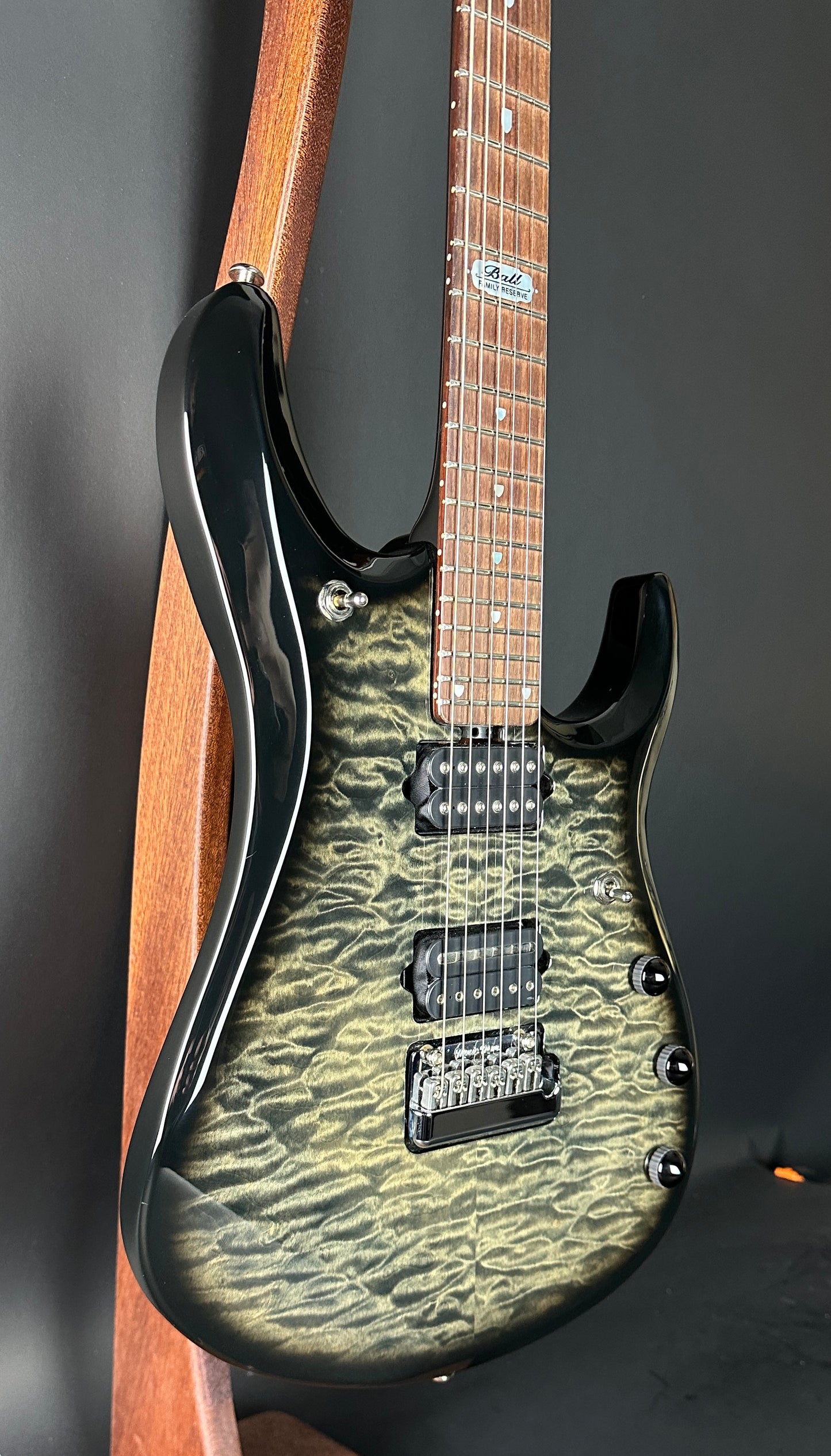 Front angle of Used 2007 Ernie Ball Family Reserve Petrucci Black Sunburst.