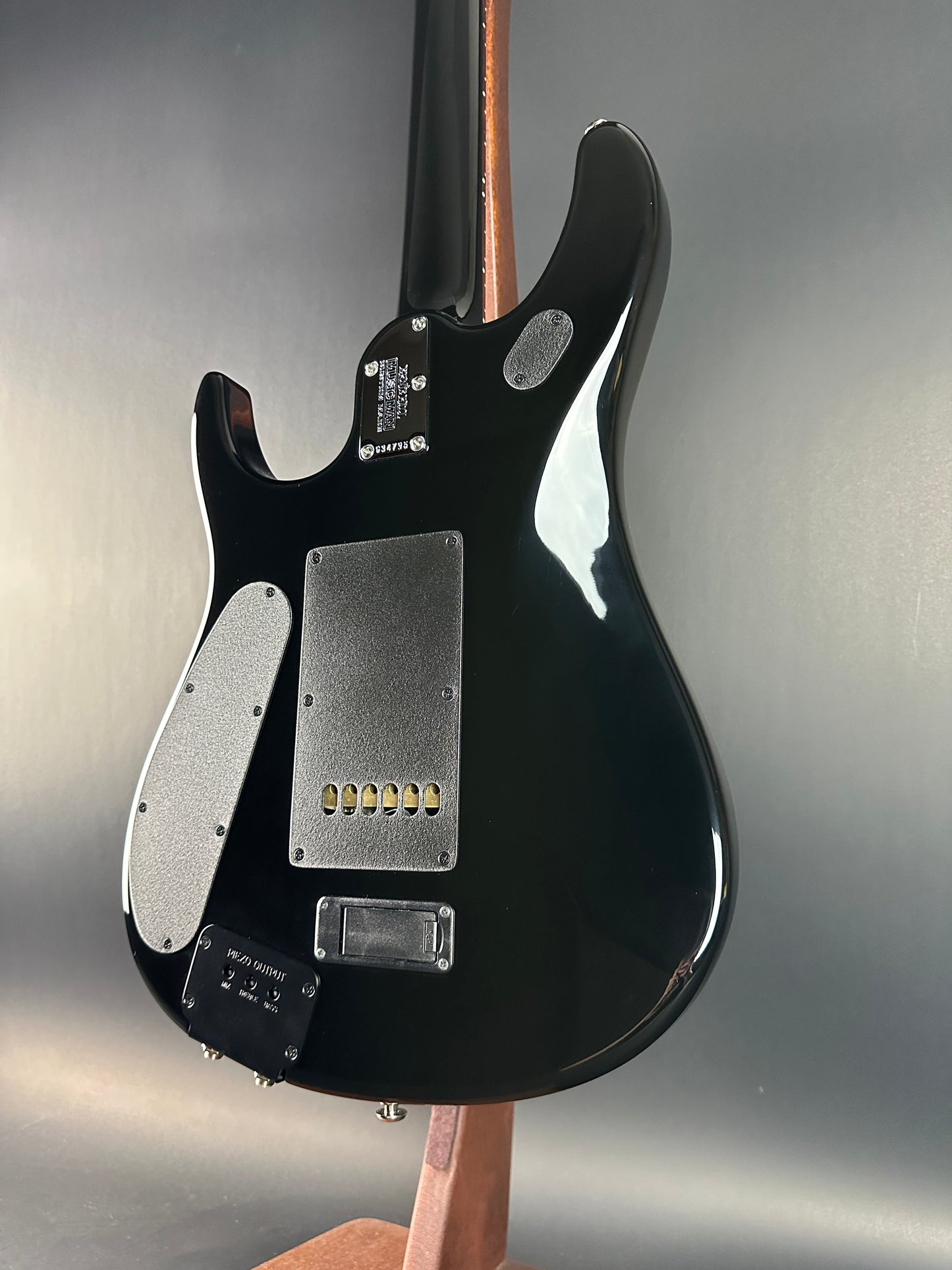 Back angle of Used 2007 Ernie Ball Family Reserve Petrucci Black Sunburst.