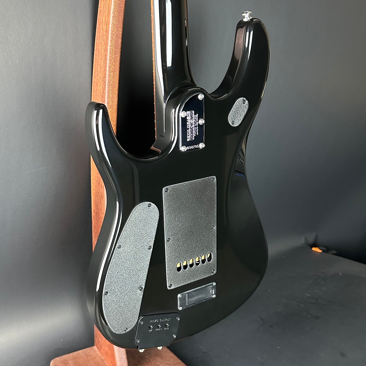 Back angle of Used 2007 Ernie Ball Family Reserve Petrucci Black Sunburst.