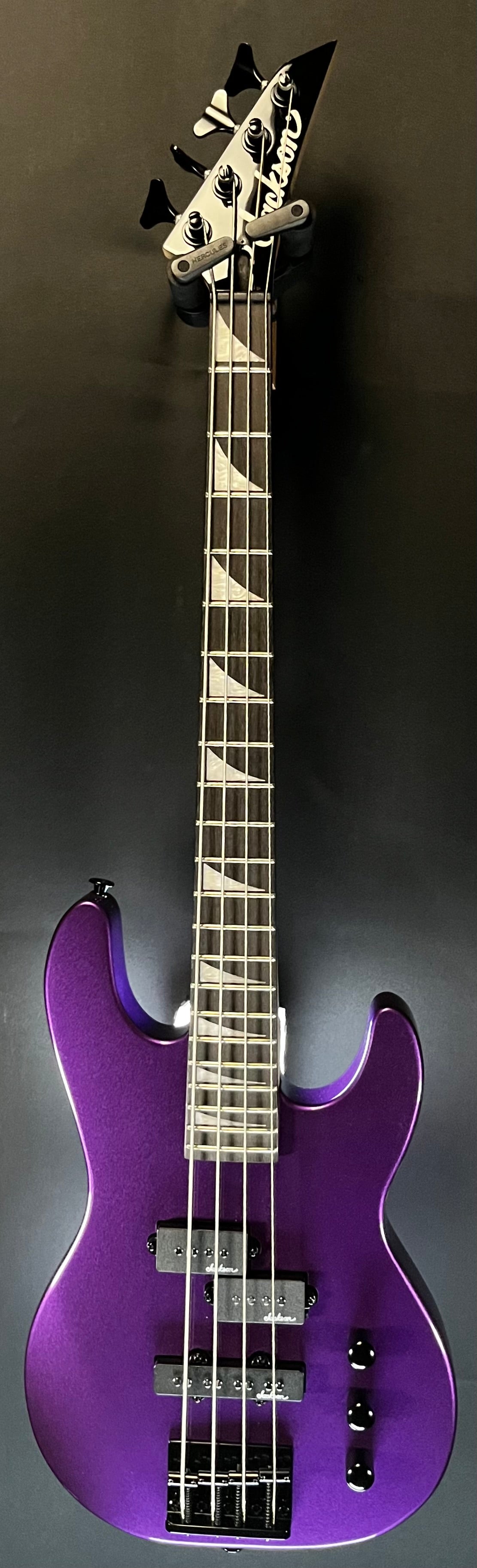 Full front of Used Jackson JS Series JS1X Minion Concert Bass Pavo Purple w/bag TFW270