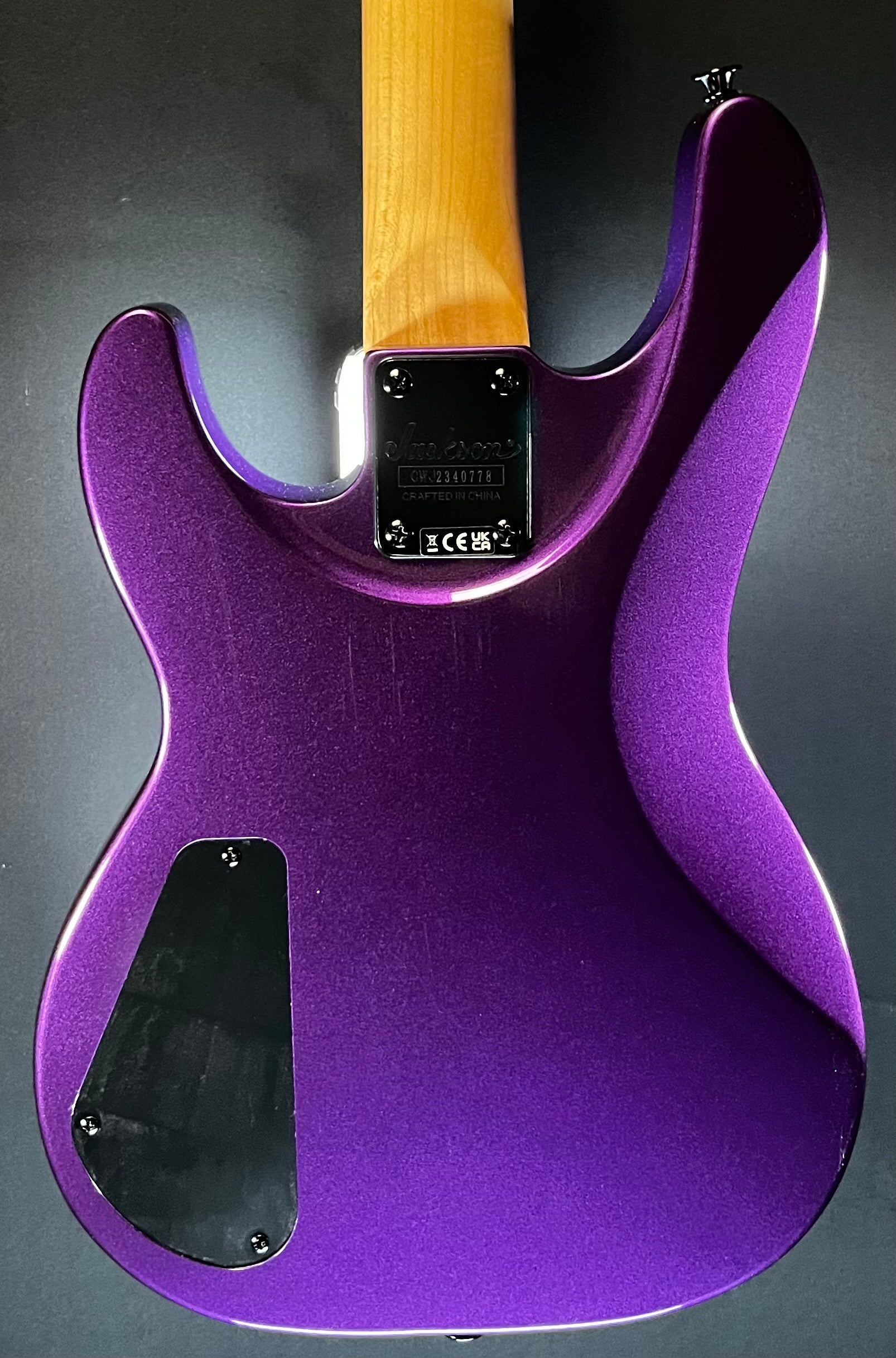 Back of Used Jackson JS Series JS1X Minion Concert Bass Pavo Purple w/bag TFW270