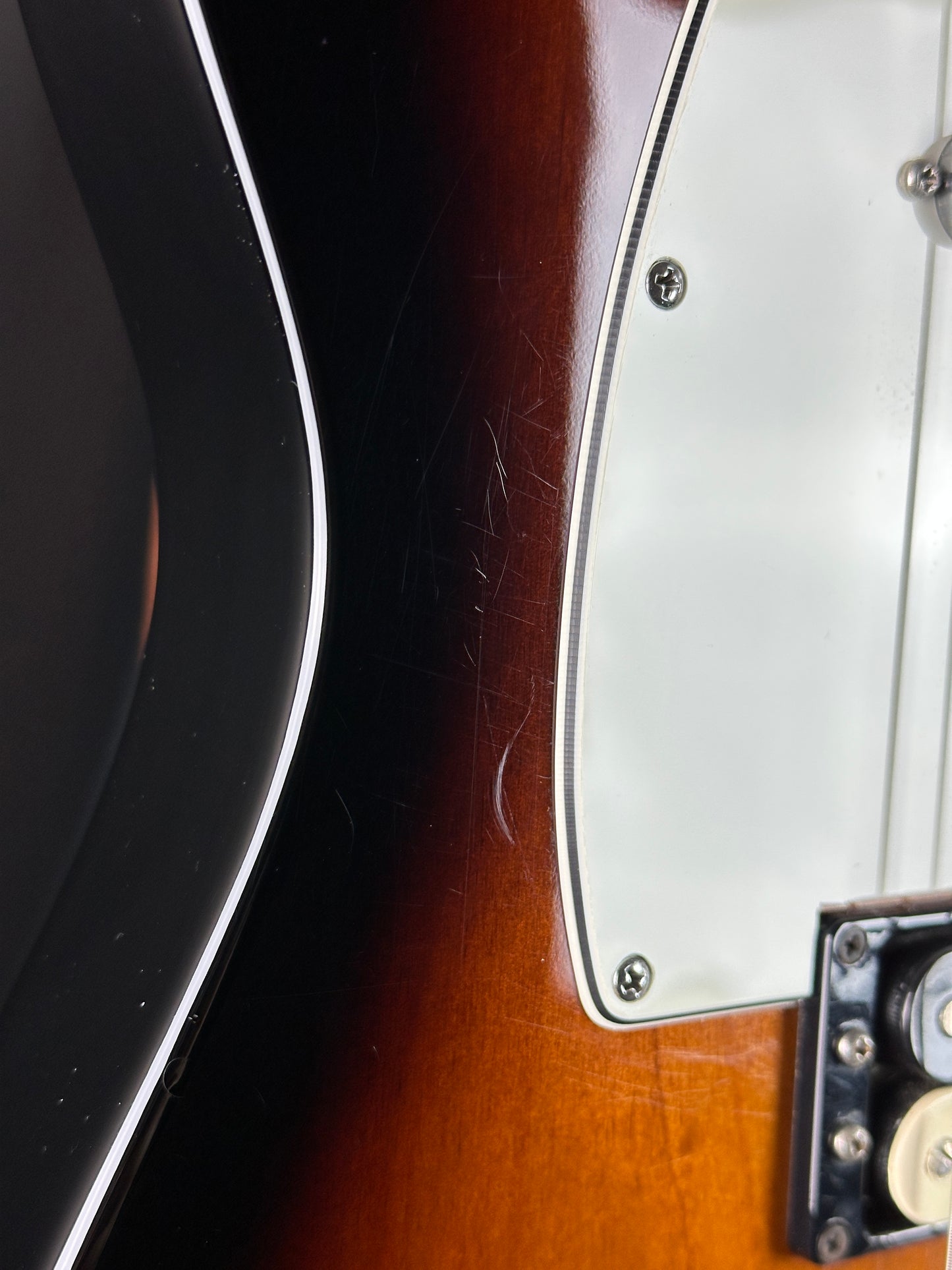 Scratches on body of Used 2014 Fender GC USA Pro Standard Telecaster HS 2-Color Sunburst.