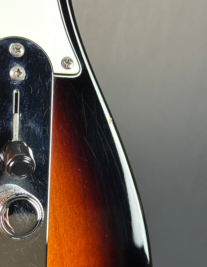 Scratches near control plate of Used 2014 Fender GC USA Pro Standard Telecaster HS 2-Color Sunburst.