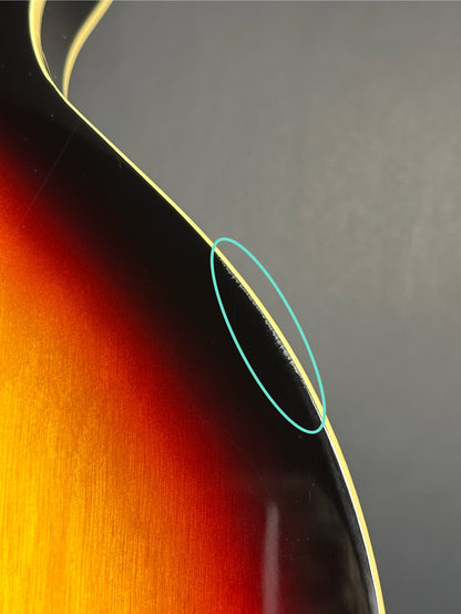 Wear on back edge of Used 2021 Epiphone Sheraton II Pro Vintage Sunburst.