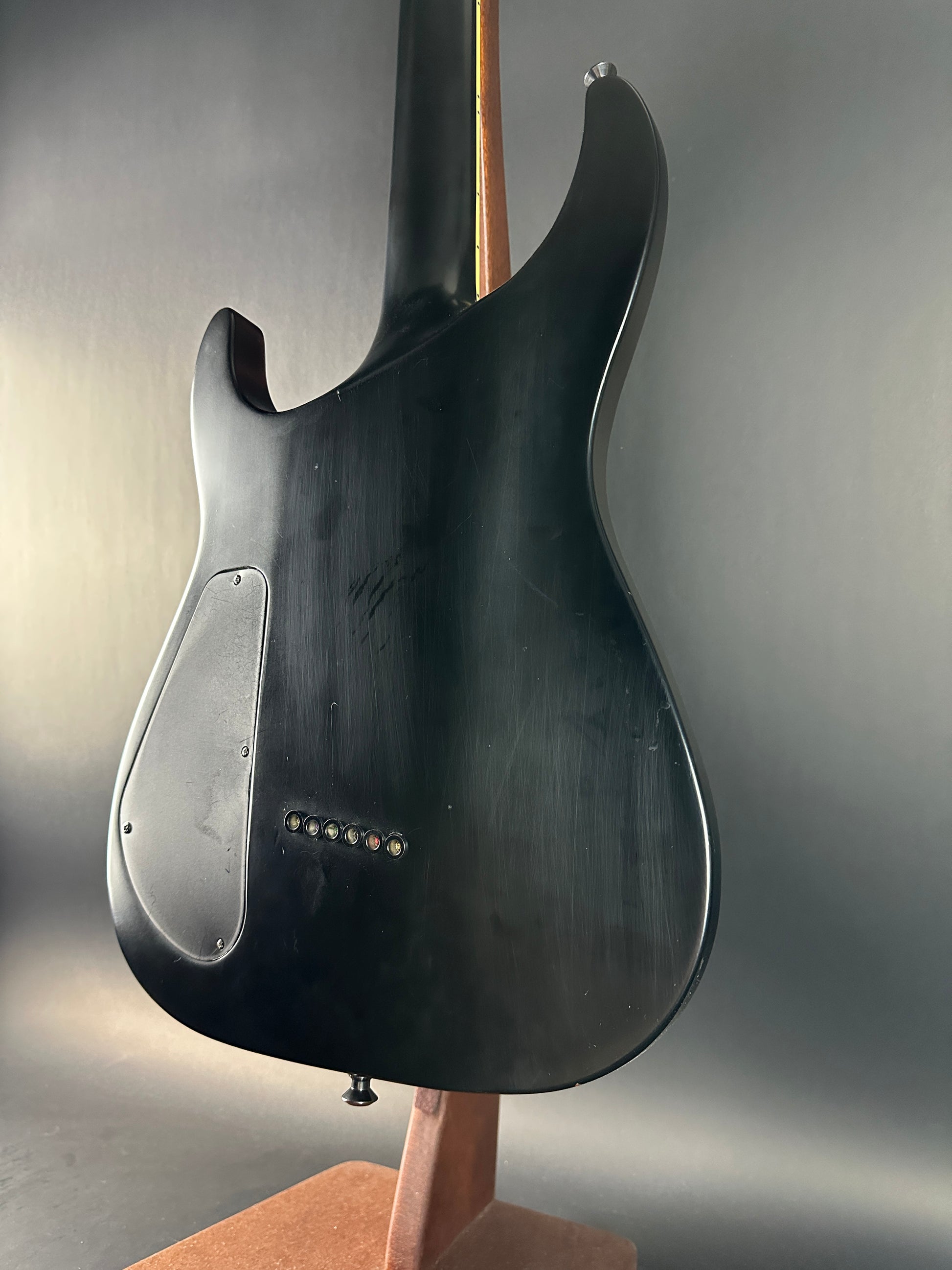 Back angle of Used Jackson SLSMG Flat Black.