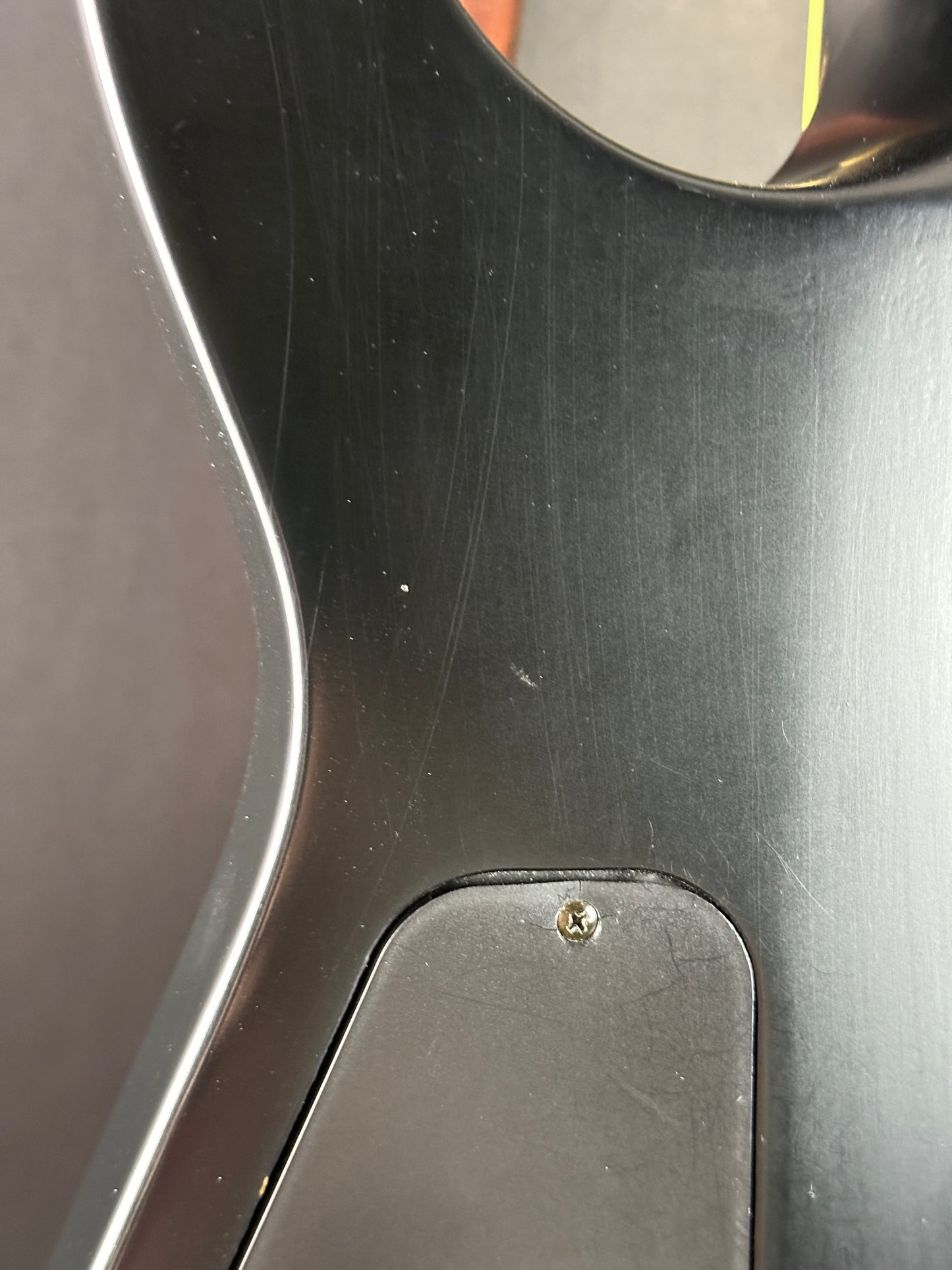 Scratches on back of Used Jackson SLSMG Flat Black.