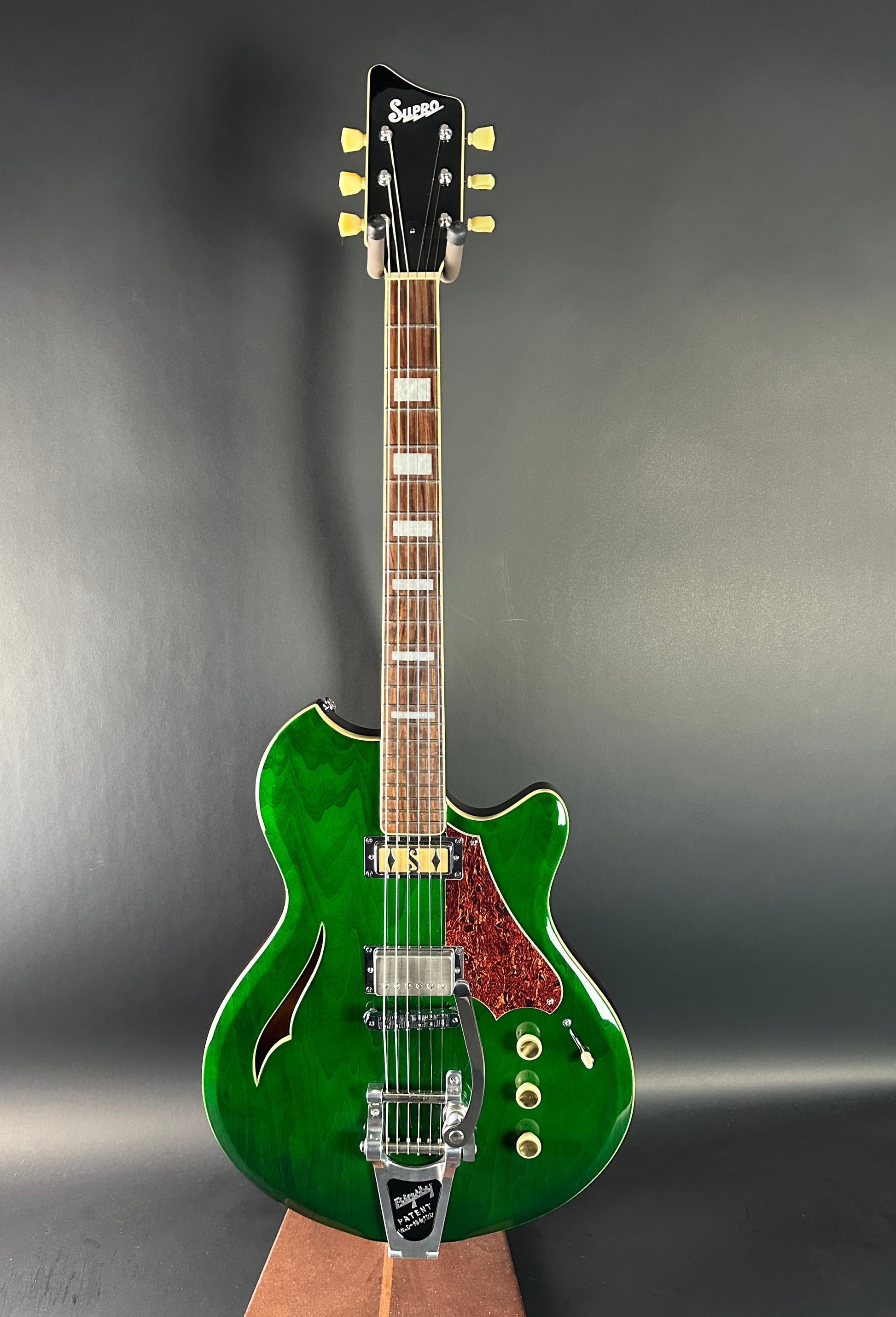 Full front of Used Supro Conquistador Green.