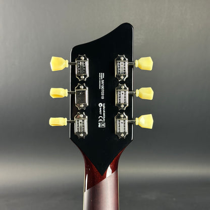 Back of headstock of Used Supro Conquistador Green.