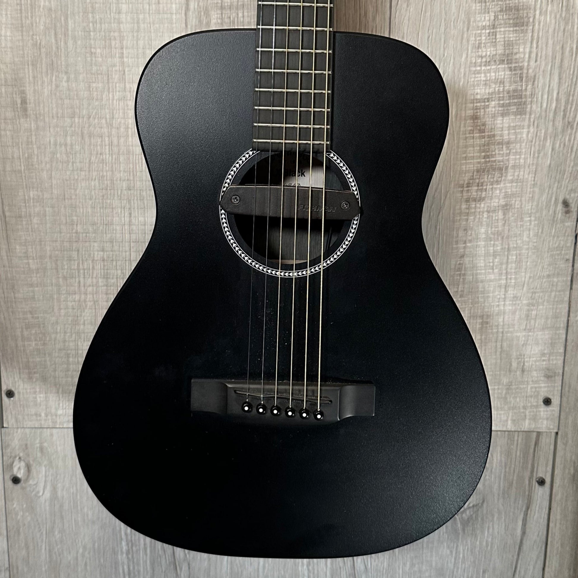 Front of Used Martin LX Black Left Handed w/bag TSS3631