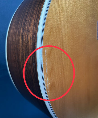 Surface gash and side scratch on upper bout of Used 2009 Guild F-512 12-String Natural w/D-TAR Load 'N Lock Wave-Length Pickup w/Case TFW514