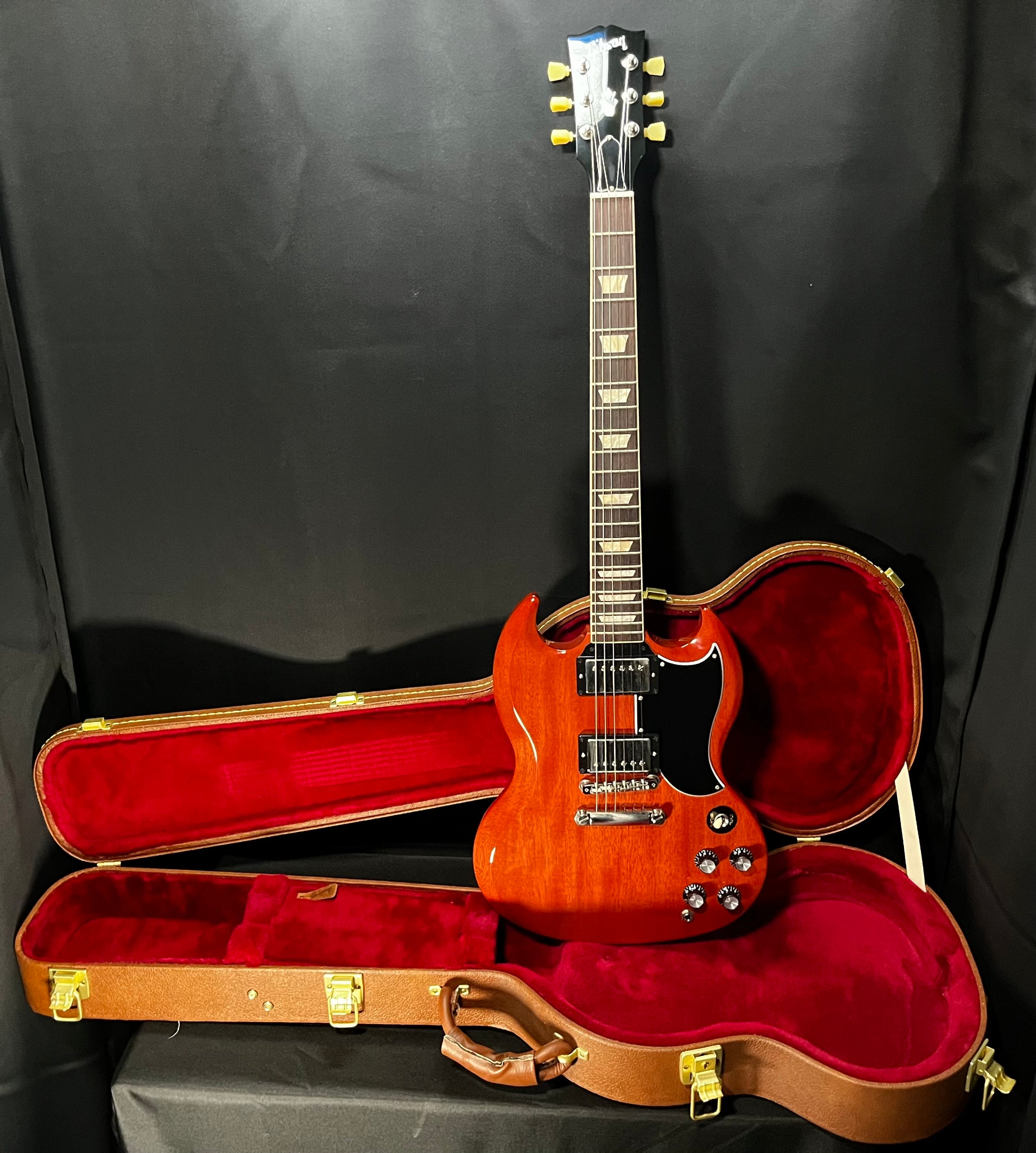 Guitar and case of Used 2022 Gibson SG Standard 61 Vintage Cherry w/Case TFW567