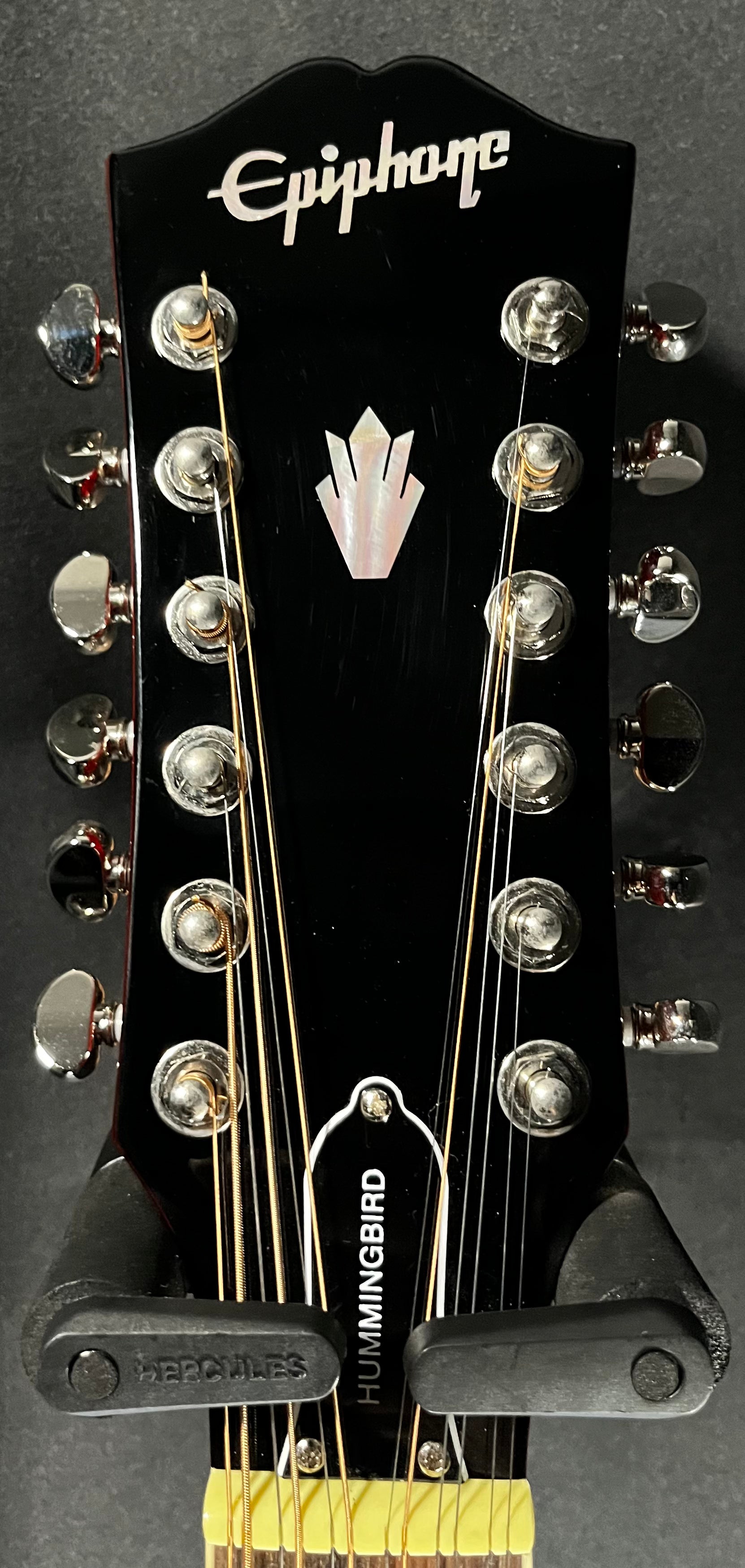 Headstock of Used 2022 Epiphone Hummingbird 12-String Dreadnought Aged Cherry Sunburst Gloss TFW590