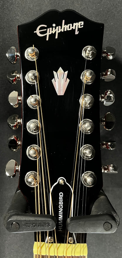 Headstock of Used 2022 Epiphone Hummingbird 12-String Dreadnought Aged Cherry Sunburst Gloss TFW590