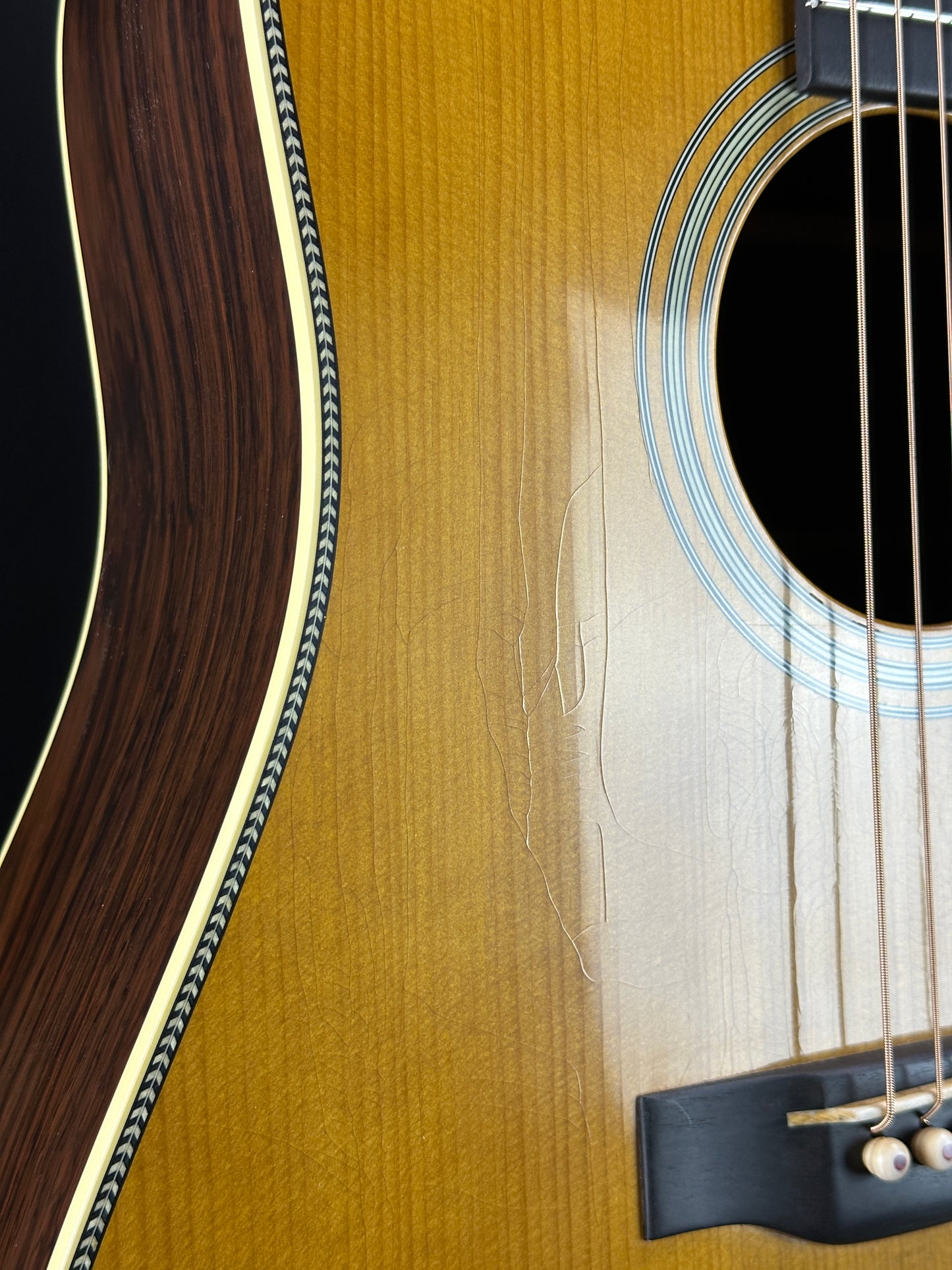 Checking near soundhole of Martin Custom Shop 37 D-28 Authentic Brazilian Rosewood Stage 1 Aging.