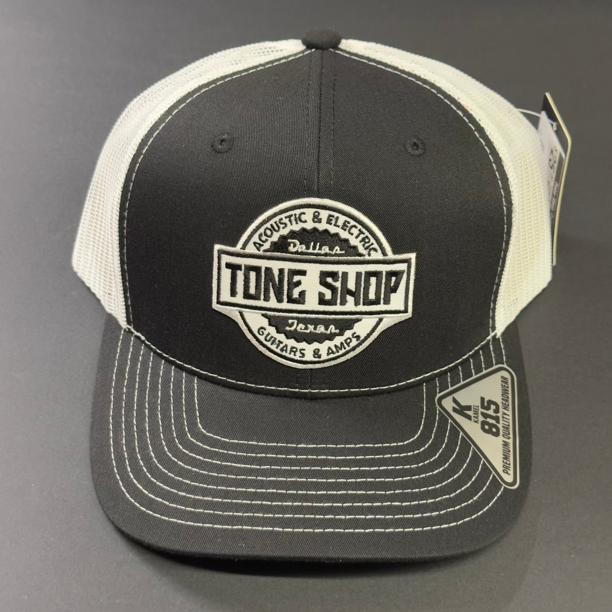 Front shot of Tone Shop Guitars Black/White Hat