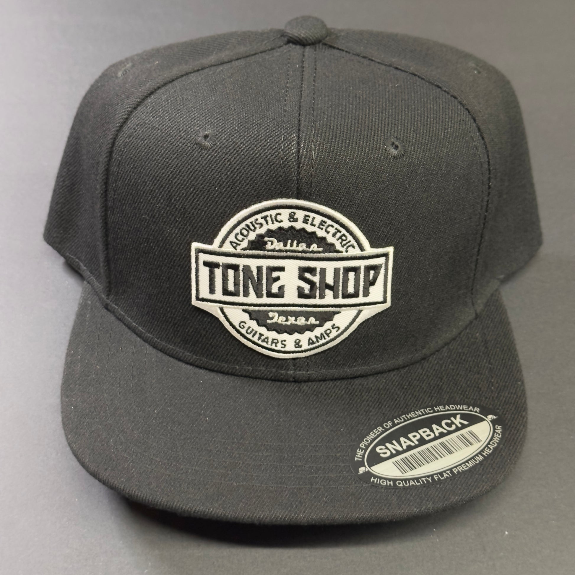 Front shot of Tone Shop Guitars Blackout Hat