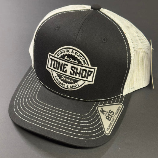 Angle shot of Tone Shop Guitars Black/White Hat