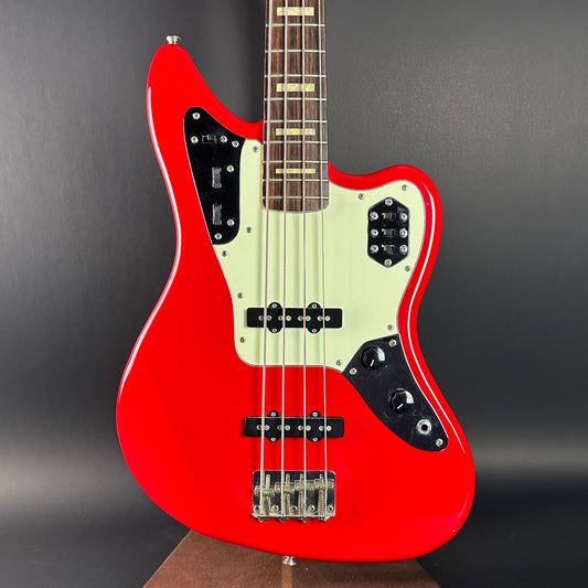 Front of Used Fender CIJ Jaguar Bass Red.