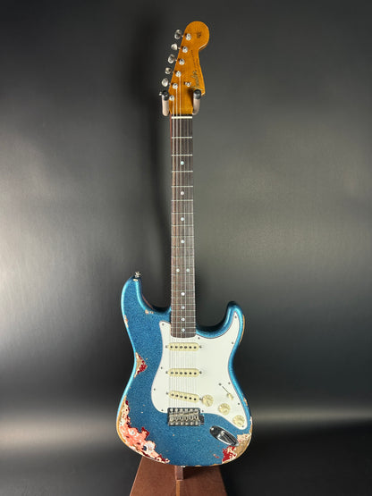 Full front of Used Fender Custom Shop GC Tex Strat Heavy Relic Blue Sparkle Over Candy Apple Red.