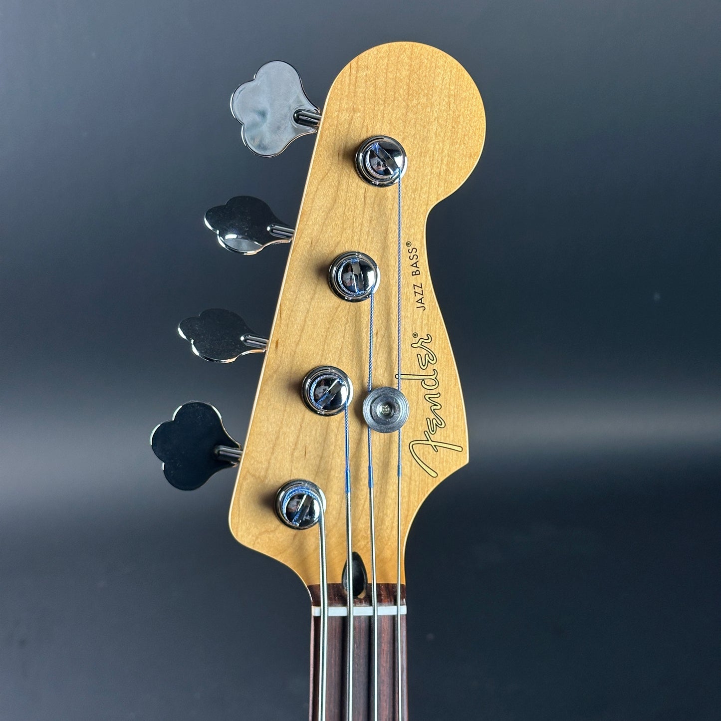 Headstock of Used 2024 Fender Player II Jazz Bass Aquatone Blue.