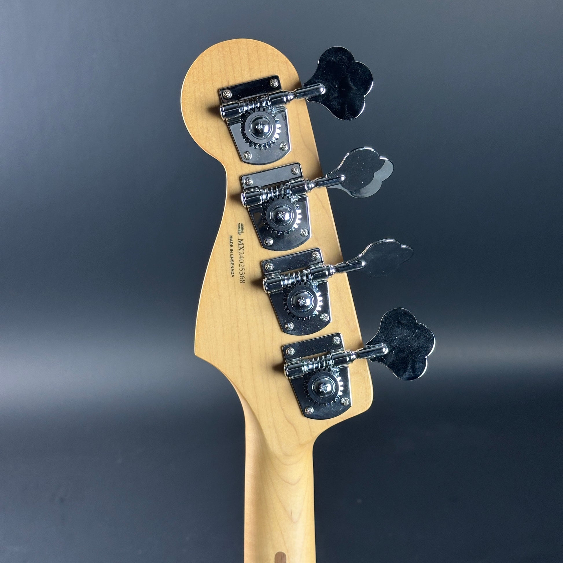 Back of headstock of Used 2024 Fender Player II Jazz Bass Aquatone Blue.