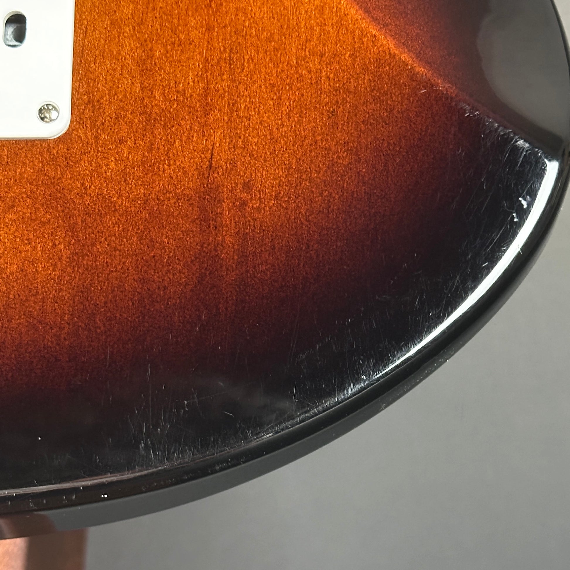 Scratches on back of Used Yamaha Pacifica PAC212VFM Burst.