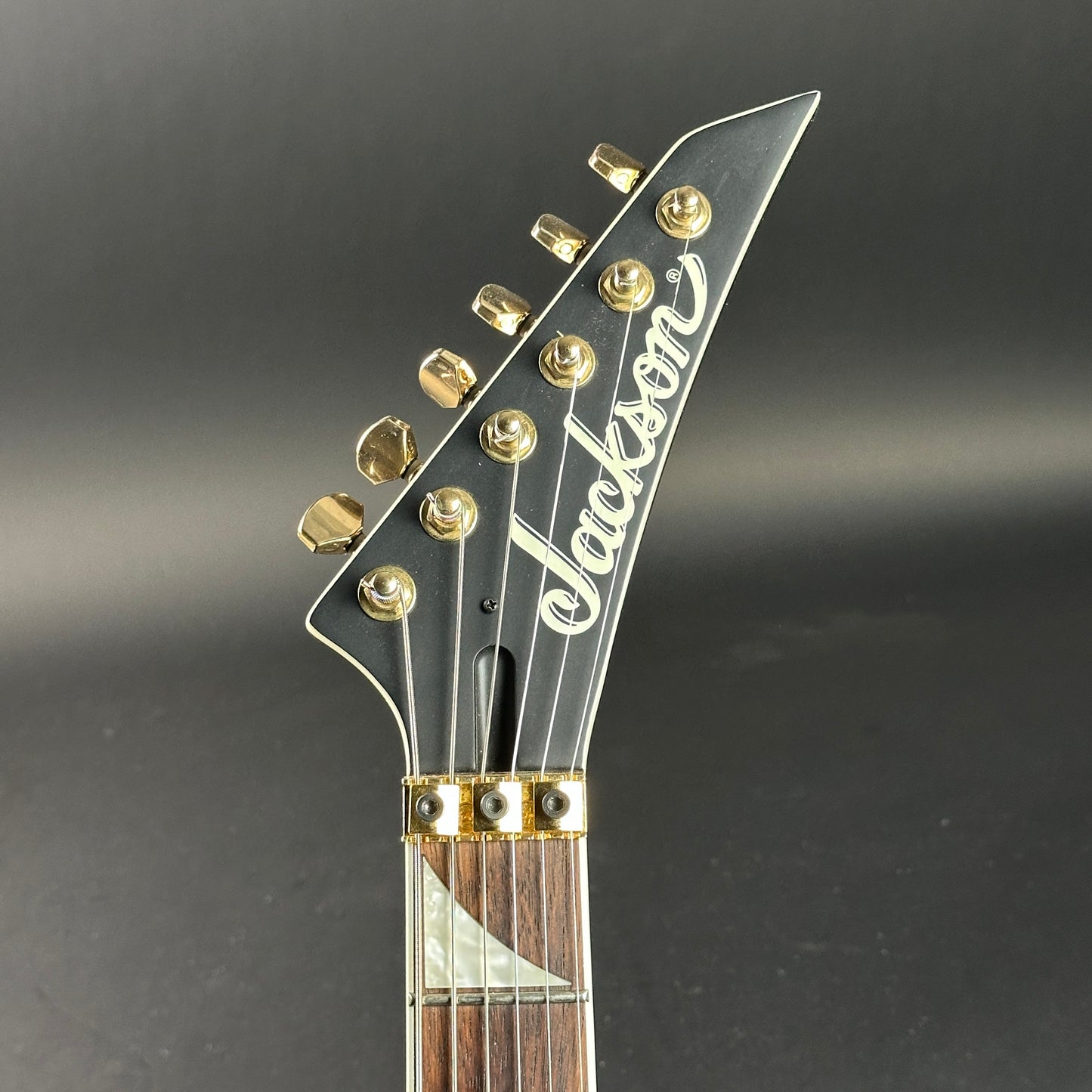 Headstock of Used Jackson X Series Soloist SLX DX Matte Black.