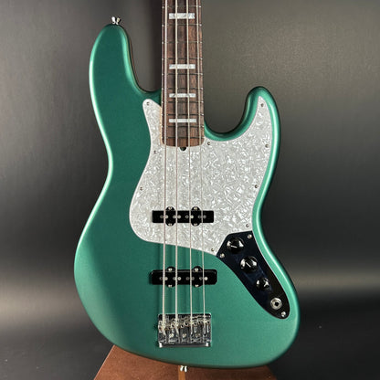 Front of Used Fender Adam Clayton Jazz Bass Green.