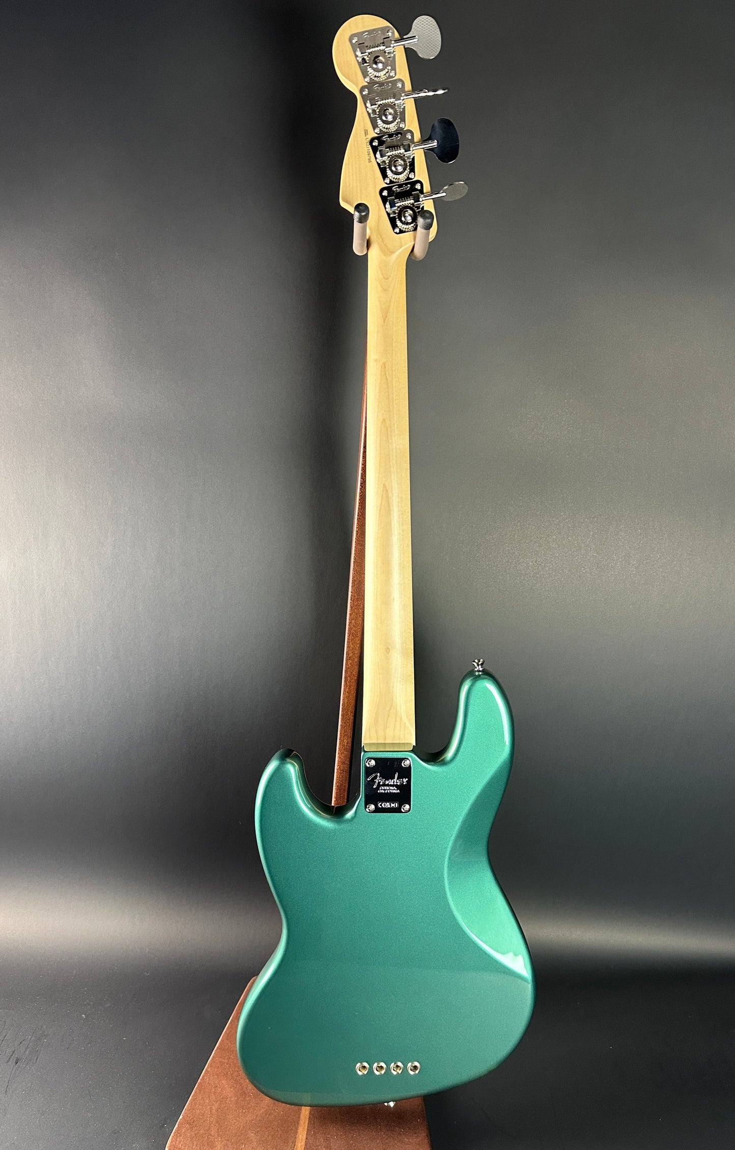 Full back of Used Fender Adam Clayton Jazz Bass Green.