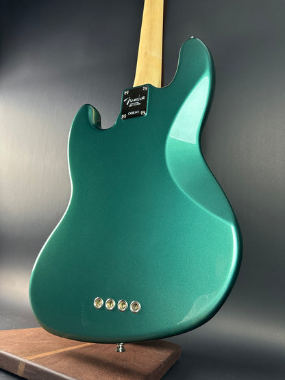 Back angle of Used Fender Adam Clayton Jazz Bass Green.