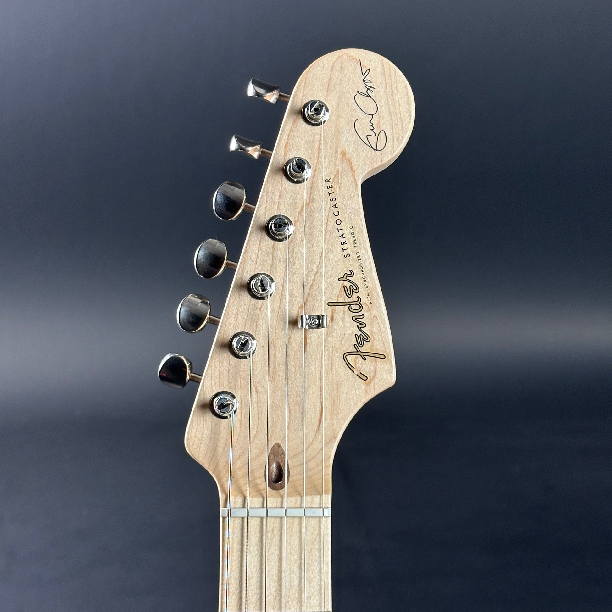 Headstock of Used Fender Eric Clapton Signature Strat Torino Red.