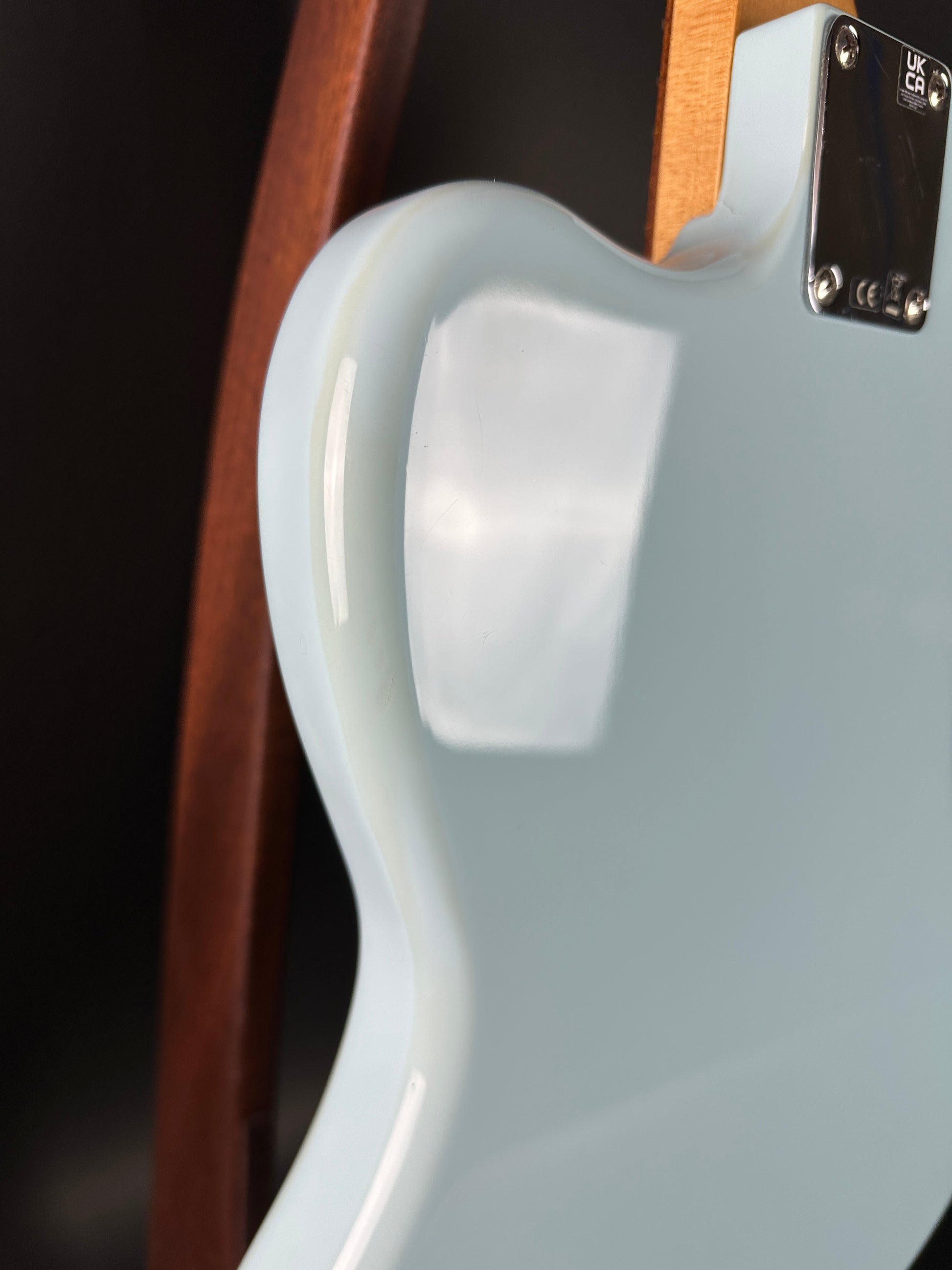 Discoloration on back edge of Used 2021 Fender Vintera Jaguar Mod Daphne Blue.