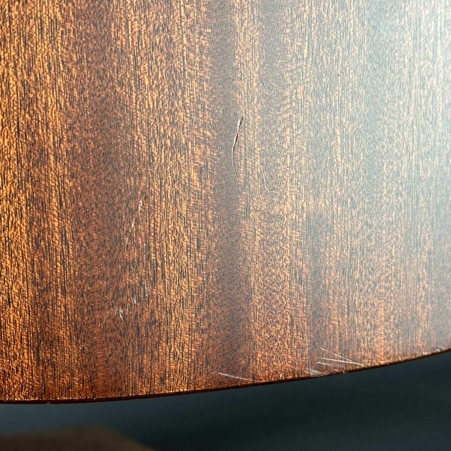 Scratches on back of Used Martin D-10e.