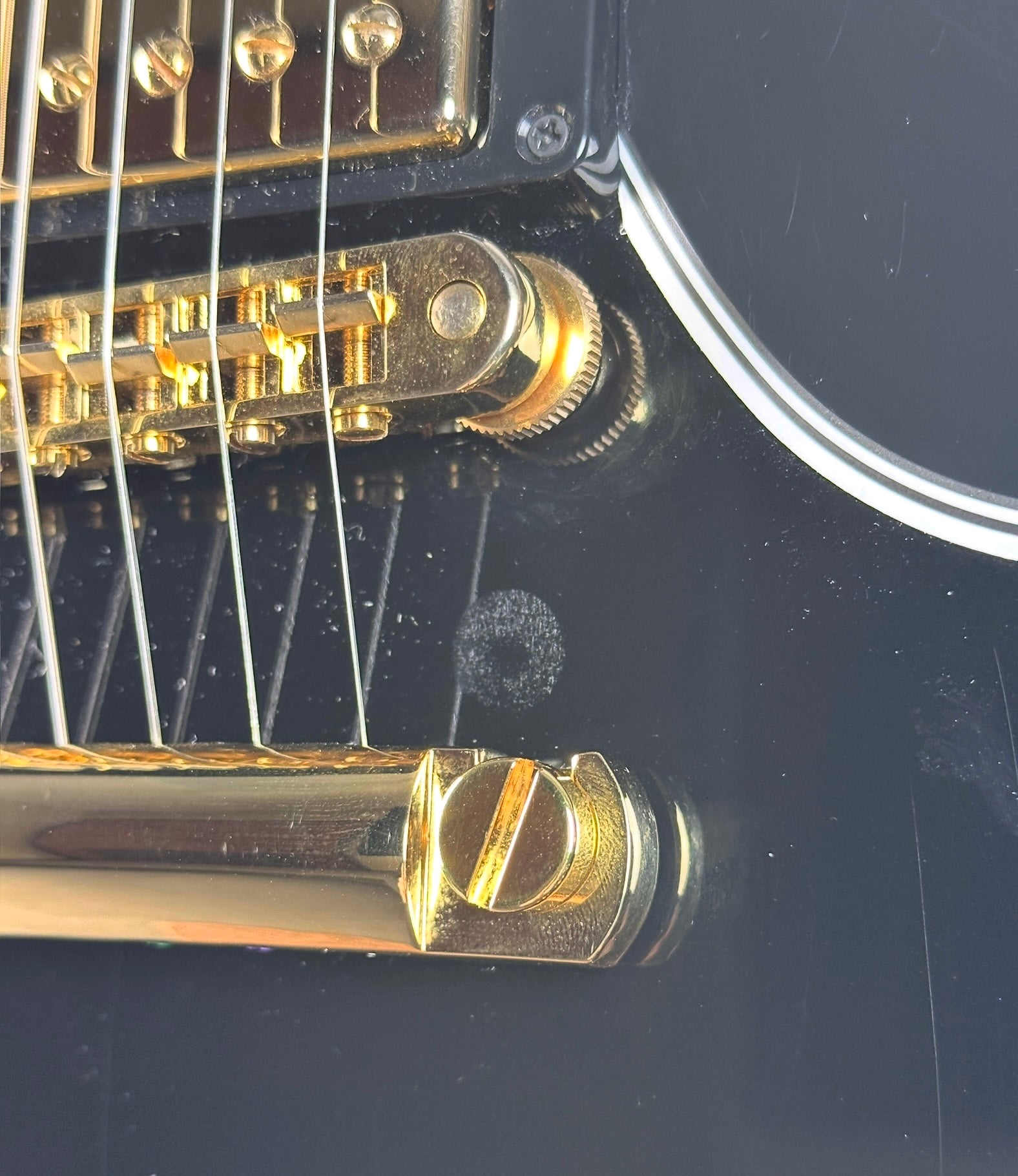 Mark near bridge of Used 2010 Gibson Custom Shop SG Custom Ebony.