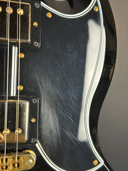 Scratches on pickguard of Used 2010 Gibson Custom Shop SG Custom Ebony.