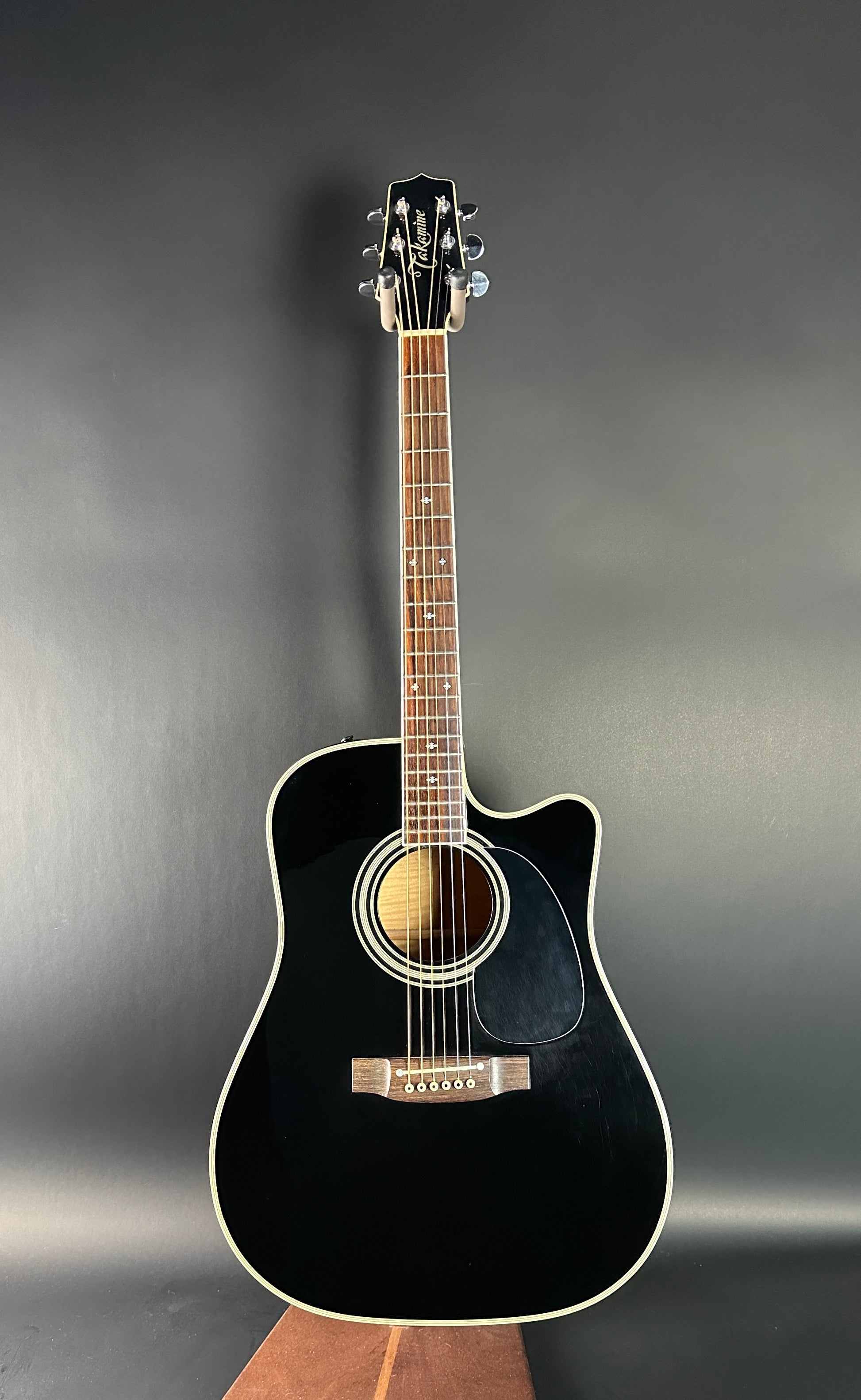 Full front of Used Takamine EF341c Black.