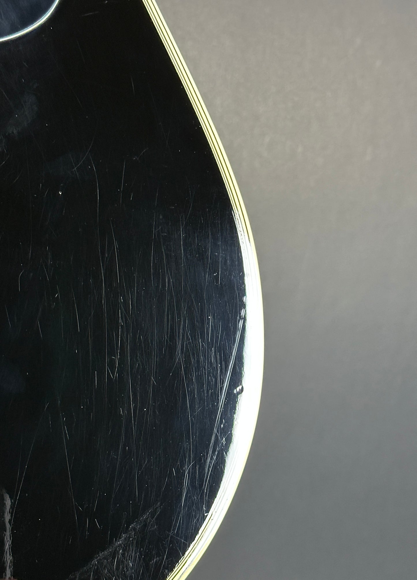 Scratches on body of Used Takamine EF341c Black.