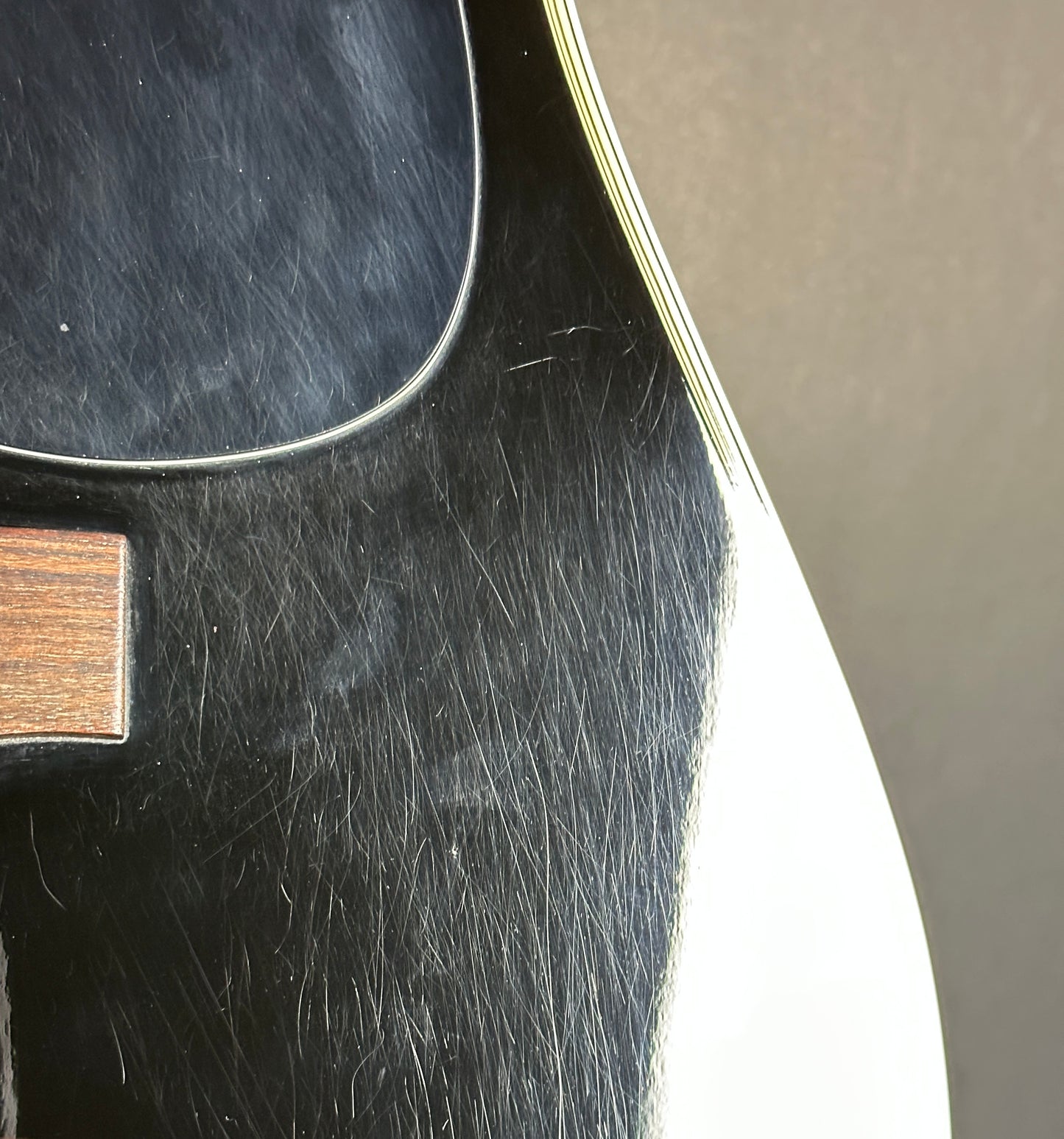 Scratches on body of Used Takamine EF341c Black.