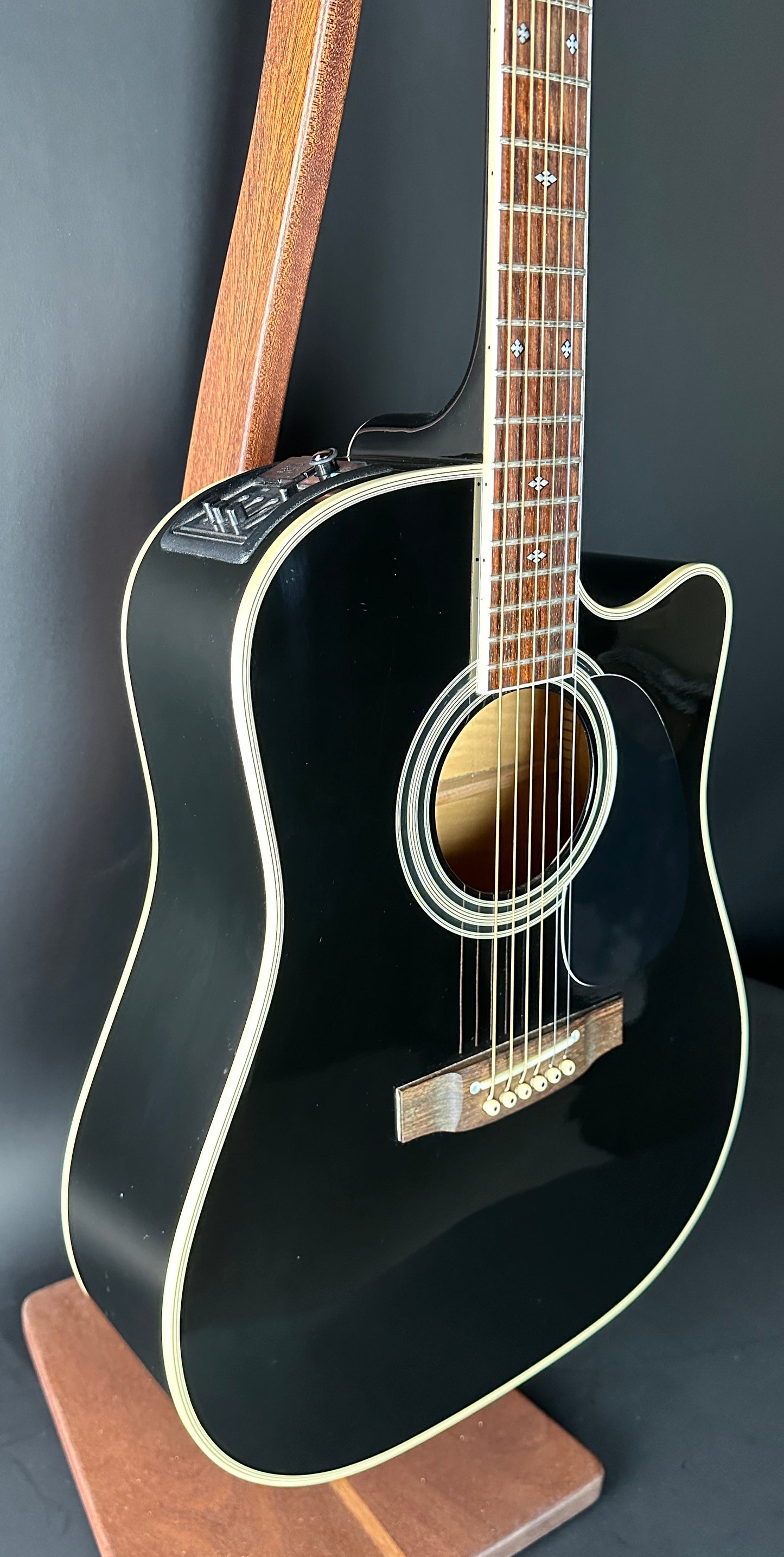 Front angle of Used Takamine EF341c Black.