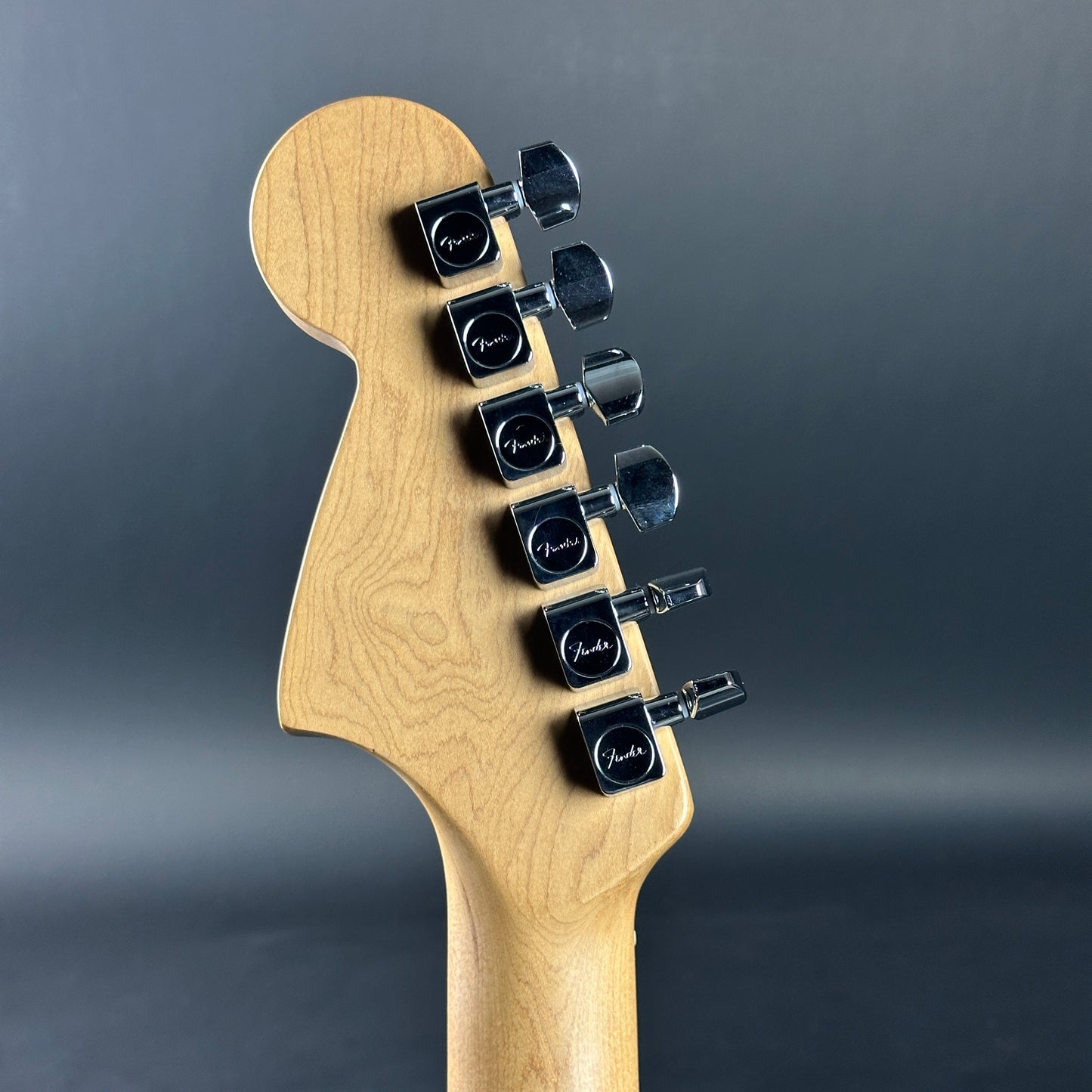 Back of headstock of Used Fender Mod Shop Jaguar Roasted Maple Desert Sand.