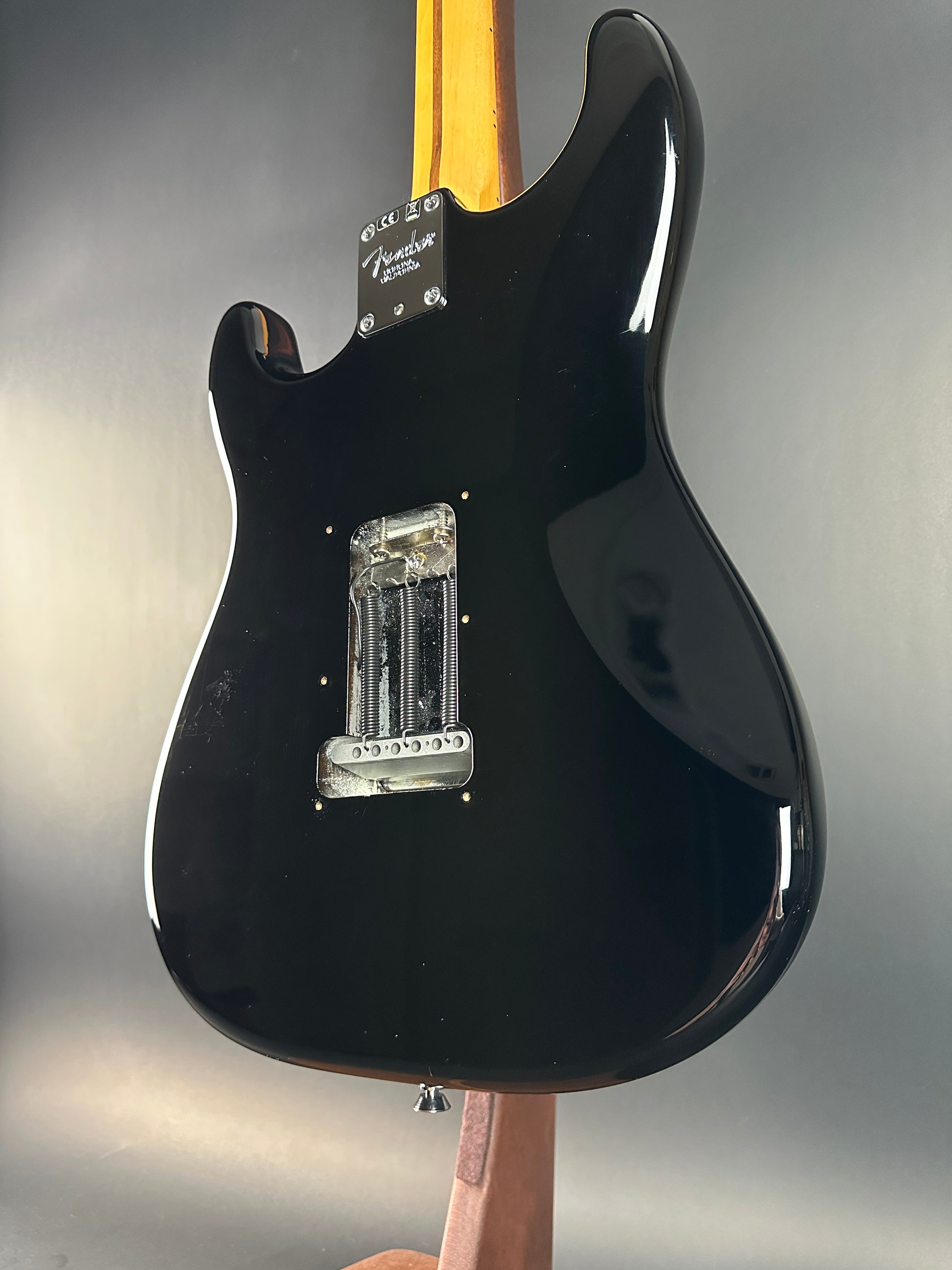 Back angle of Used 2013 Fender American Standard Strat Black.