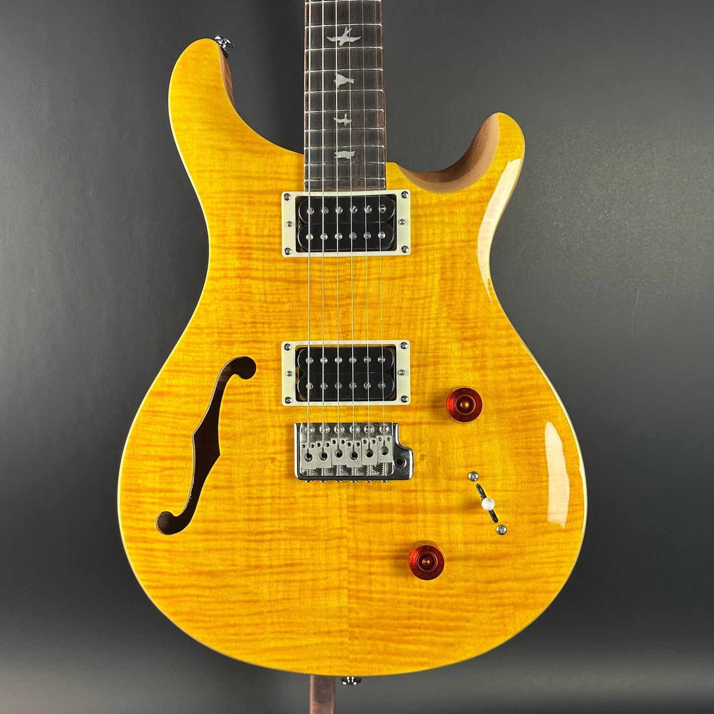 Front of Used PRS SE Custom 22 Semi-hollow Santana Yellow.