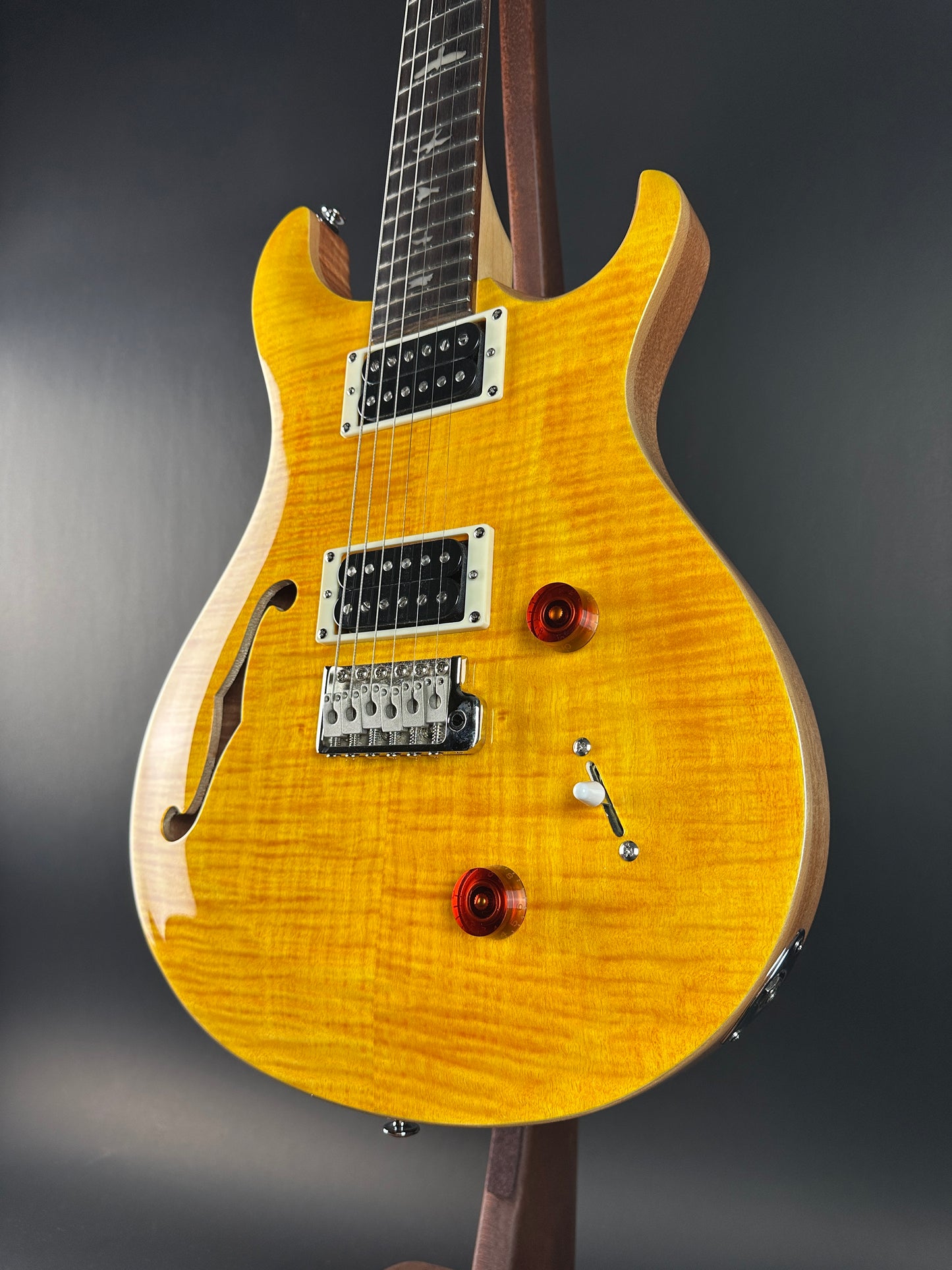 Front angle of Used PRS SE Custom 22 Semi-hollow Santana Yellow.