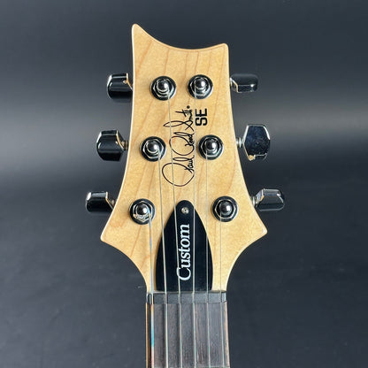 Headstock of Used PRS SE Custom 22 Semi-hollow Santana Yellow.