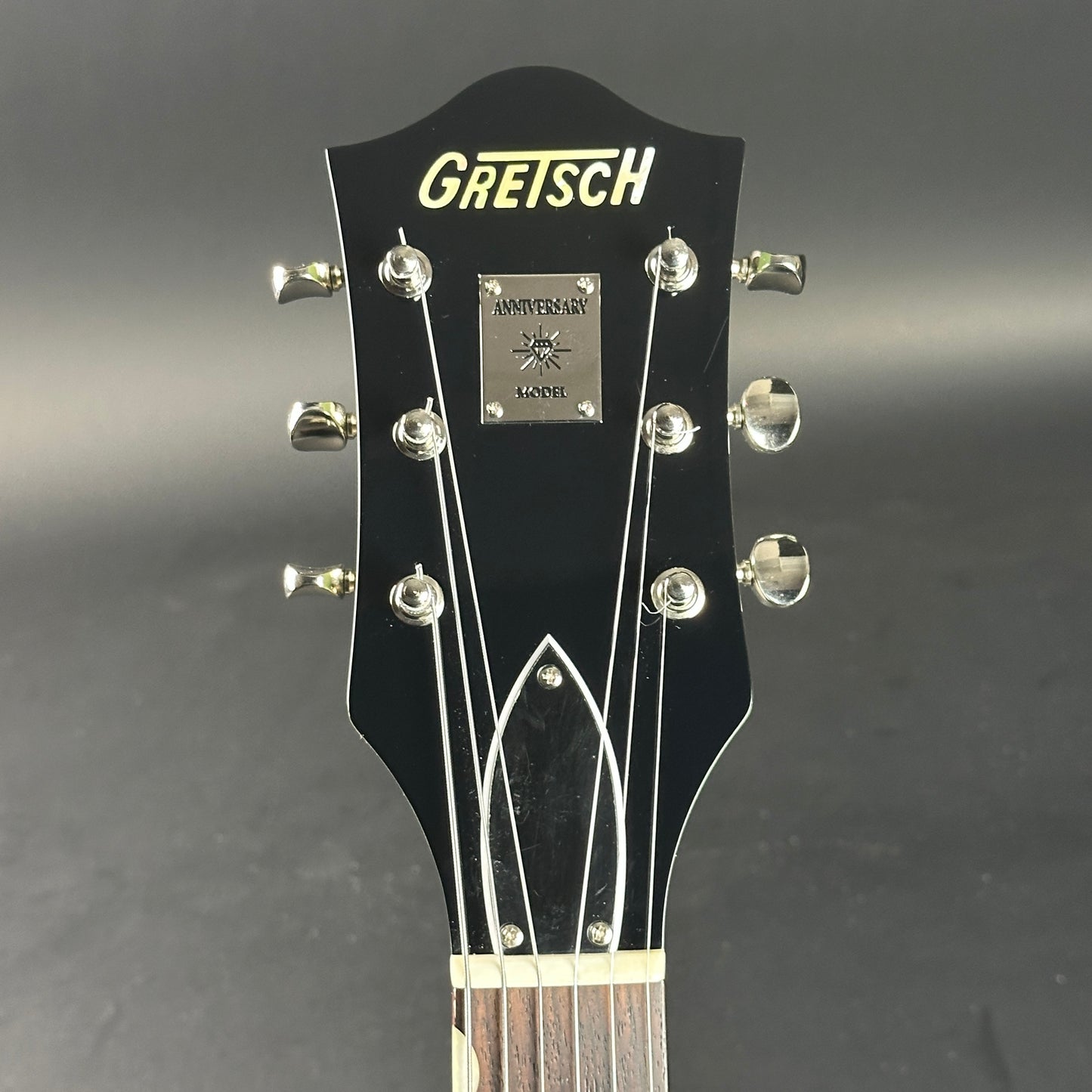 Headstock of Used Gretsch G6118T-60 Vintage Select 60th Anniversary Smoke Green.