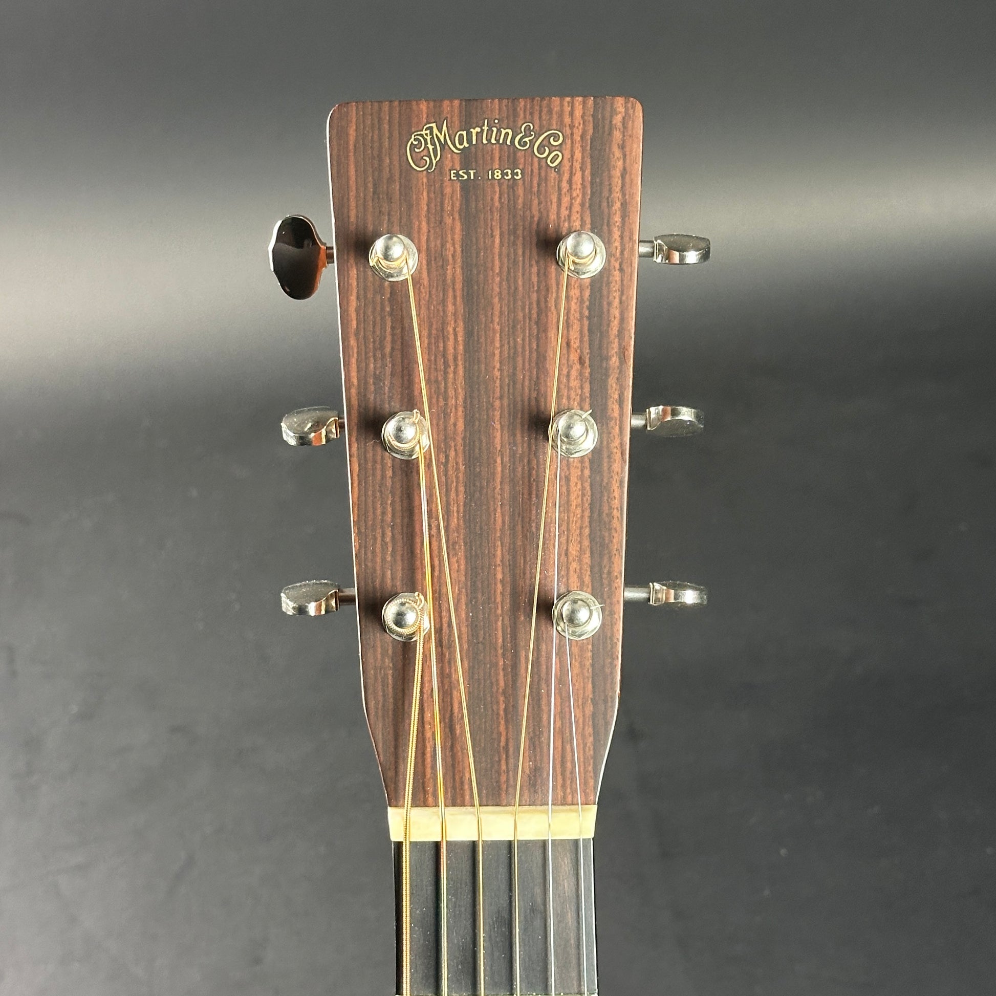 Headstock of Used Martin OM-28 The Podium 50th Anniversary.