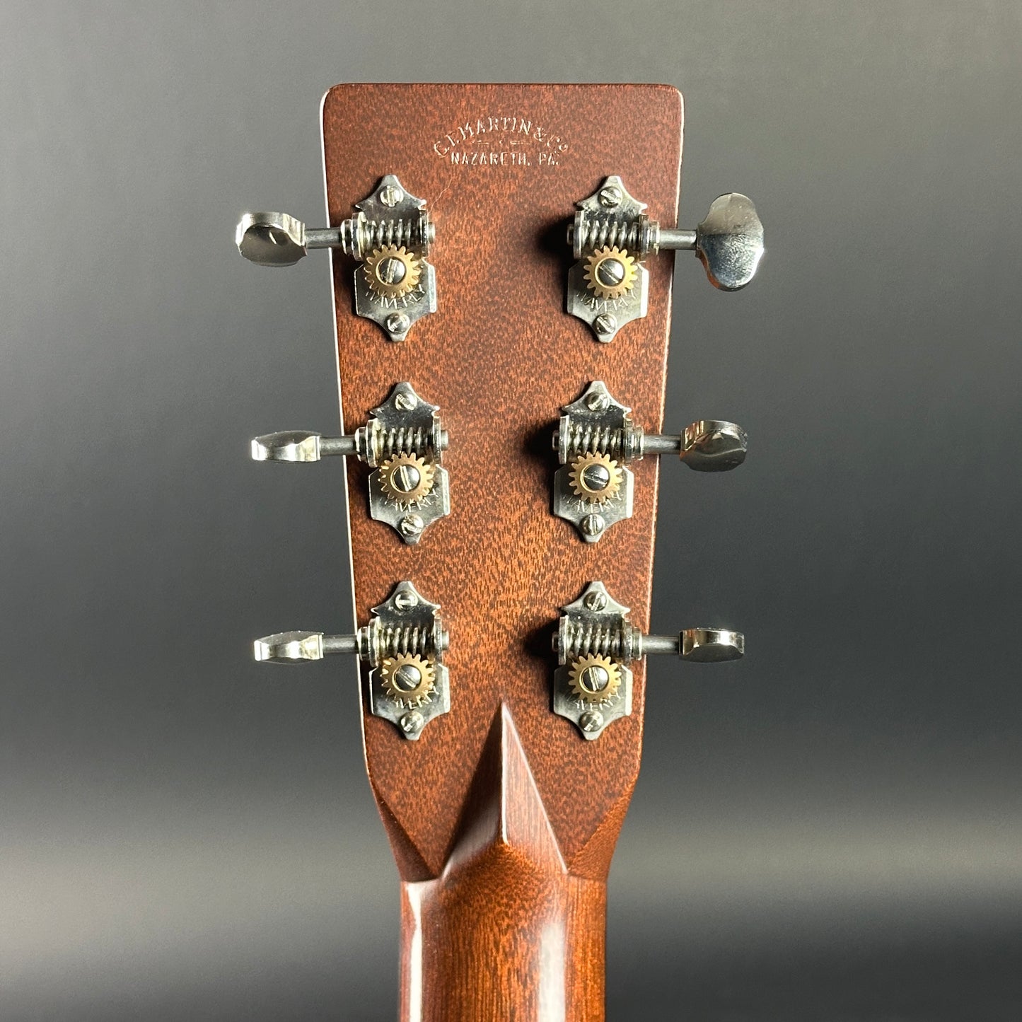 Back of headstock of Used Martin OM-28 The Podium 50th Anniversary.